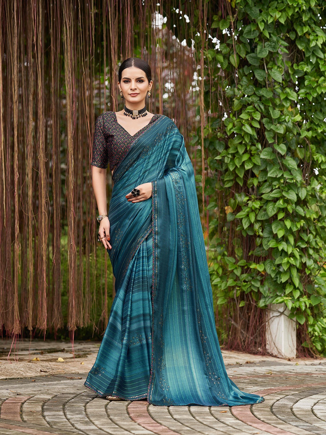 

Mitera Teal Striped Beads and Stones Pure Chiffon Saree