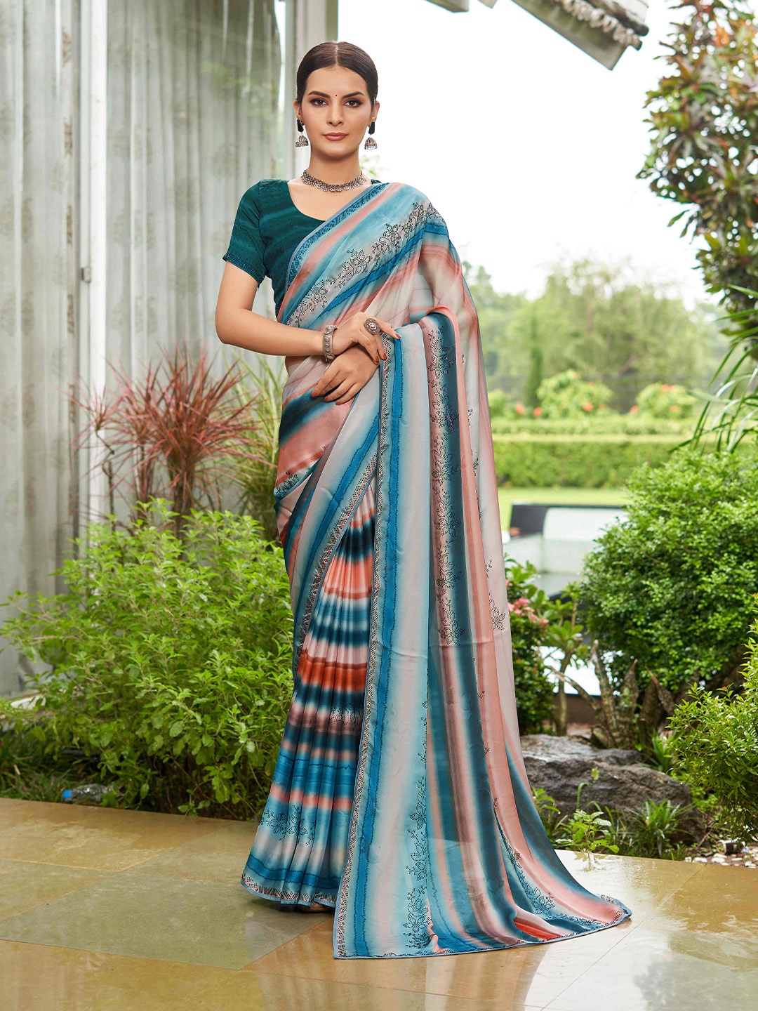 

Mitera Lehariya Sequinned Embellished Pure Georgette Saree, Teal