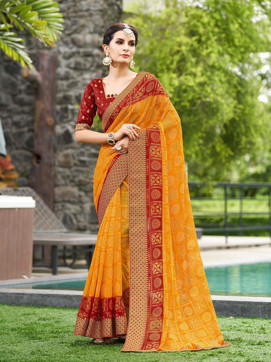 

Mitera Bandhani Printed Zari Pure Georgette Saree, Yellow
