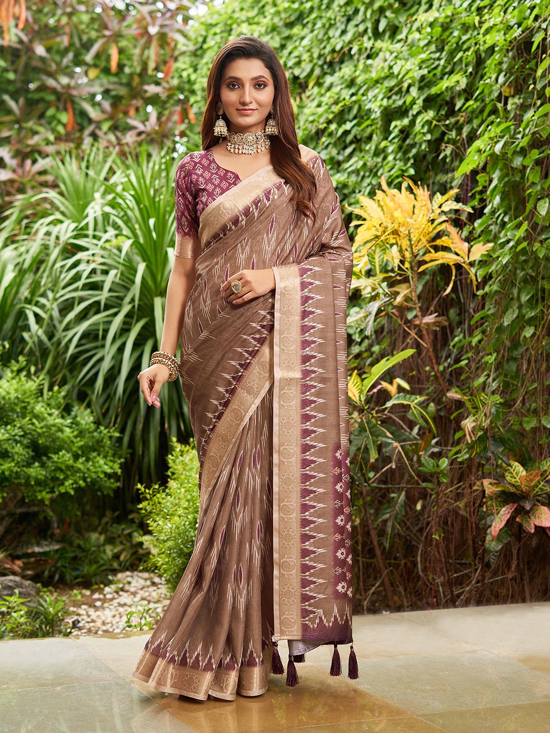 

Mitera Brown & Purple Ethnic Motifs Woven Design Zari Pure Silk Saree