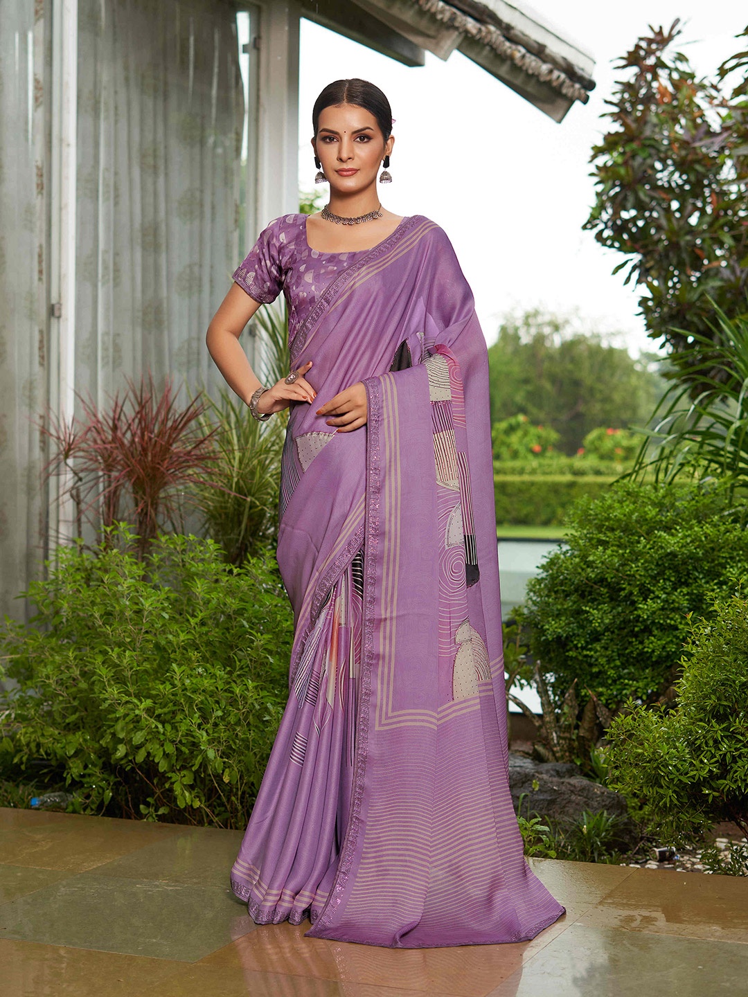 

Mitera Abstract Printed Sequinned Pure Georgette Saree, Purple