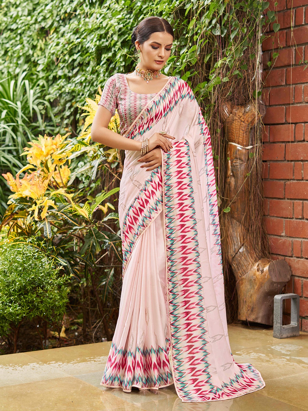 

Mitera Peach-Coloured & Green Embellished Beads and Stones Pure Georgette Saree