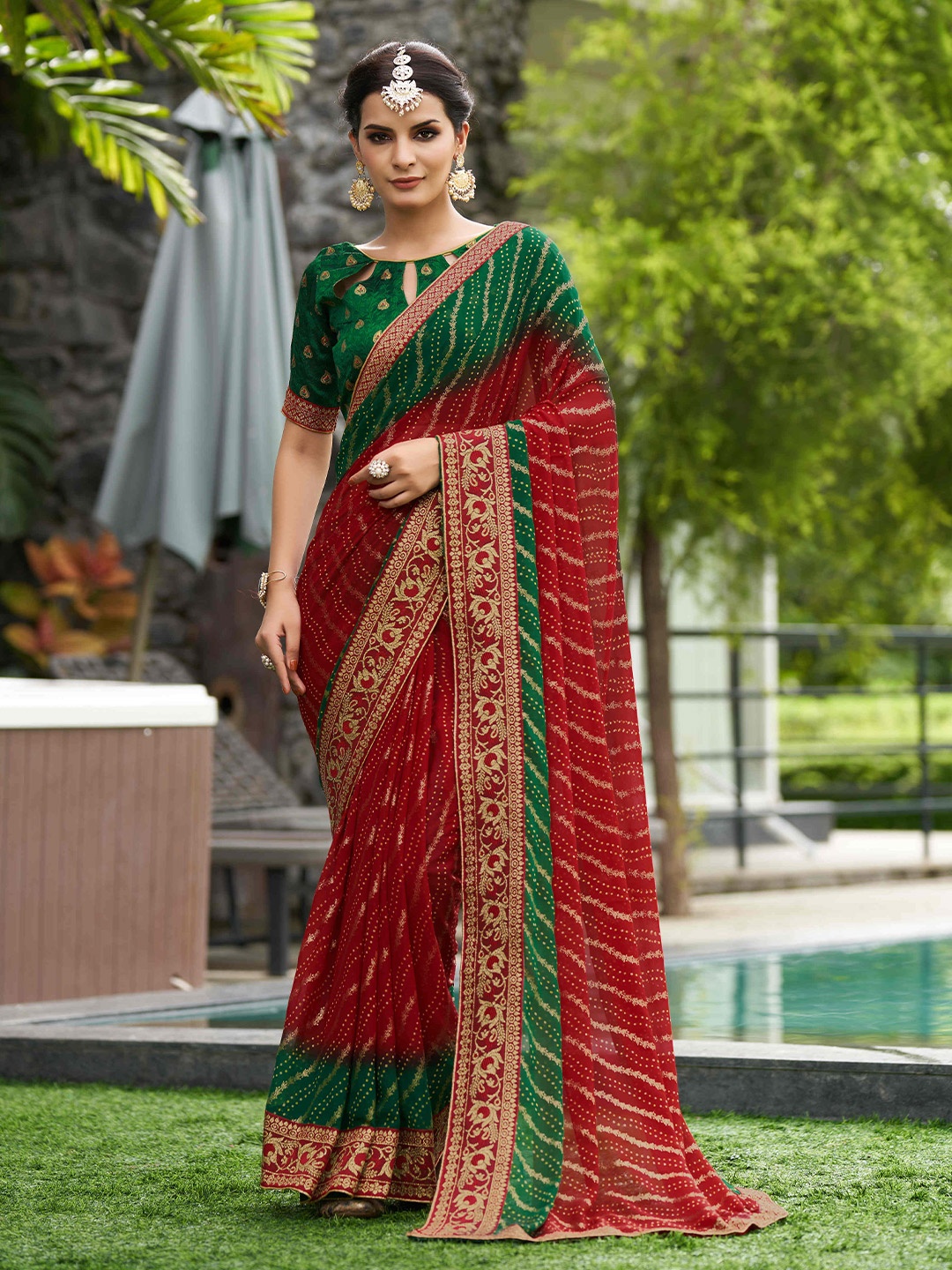 

Mitera Ethnic Motifs PrintedZari Pure Georgette Saree, Red