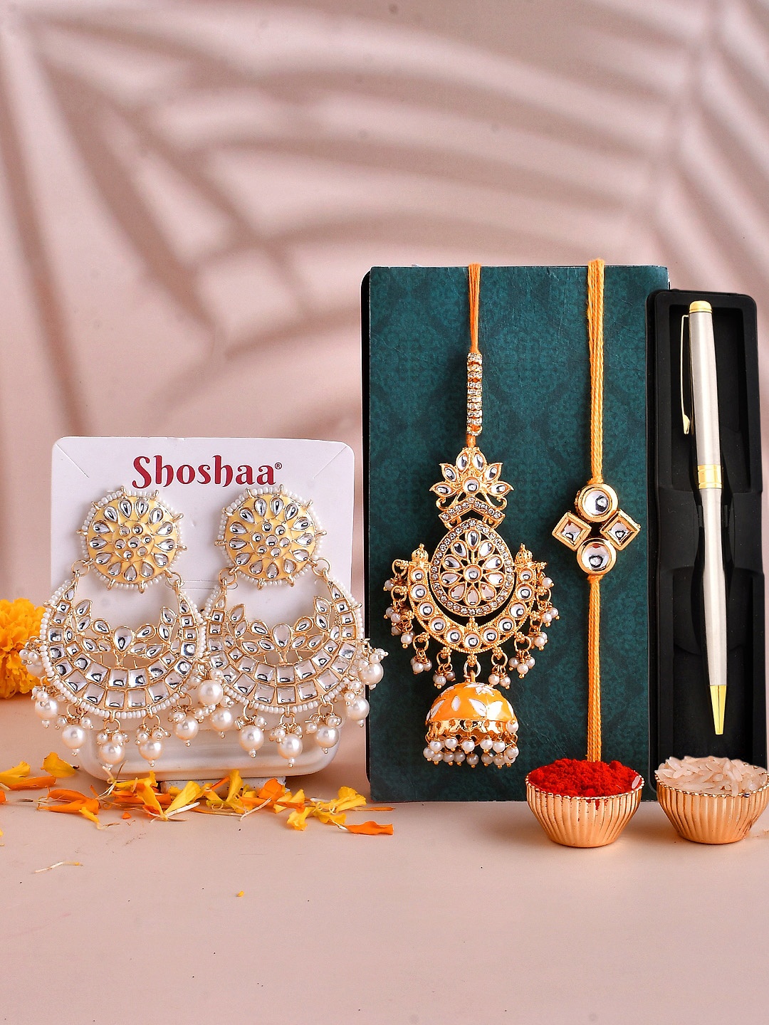 

Shoshaa Set Of 2 Kundan Rakhis With Pen & Earrings Gift Set, Yellow