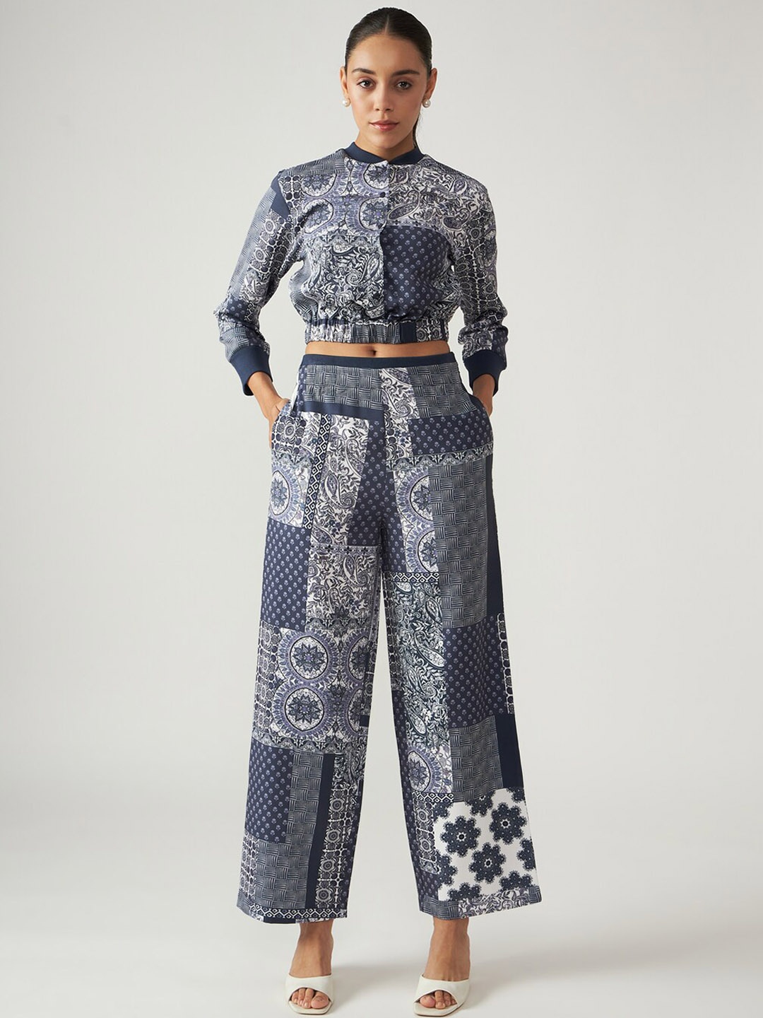 

Muvazo Women Ethnic Motifs Printed Relaxed Straight Fit Trousers, Navy blue