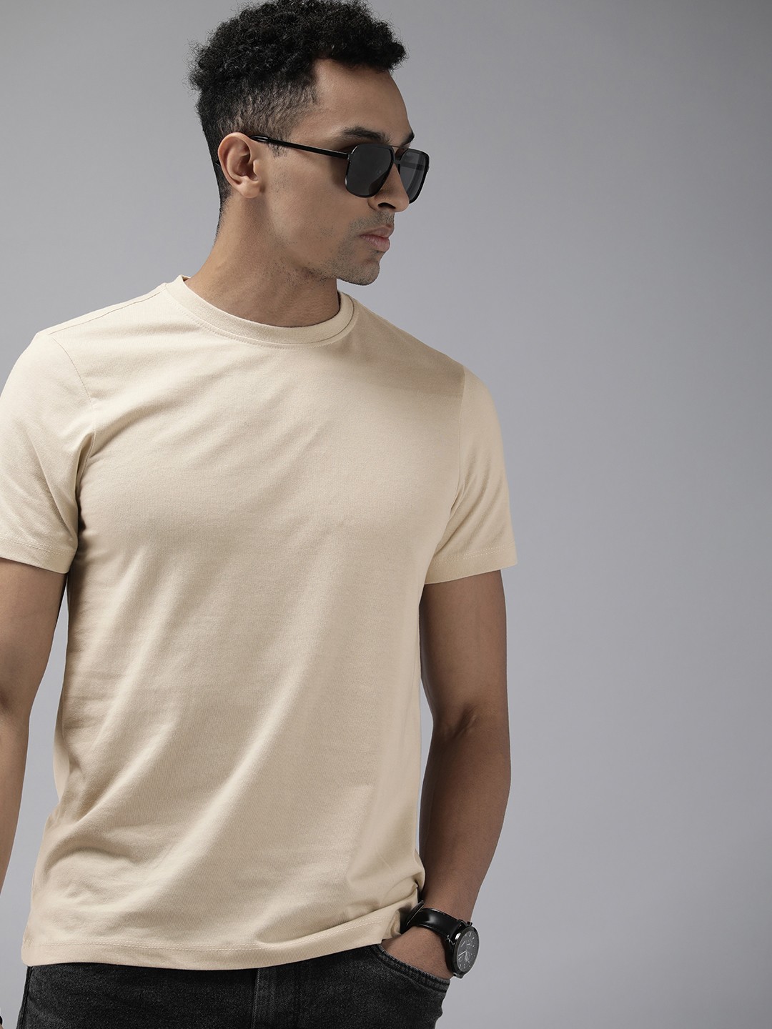 

Roadster Men Solid Pure Cotton T-shirt, Cream