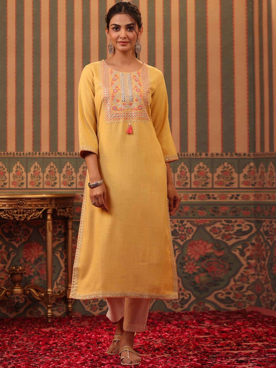 

Readiprint Fashions Ethnic Motifs Yoke Design Mirror Work Straight Kurta, Yellow