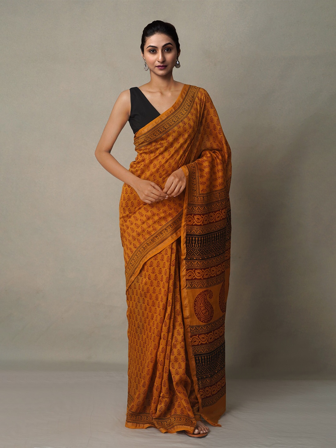 

Unnati Silks Ethnic Motifs Printed Zari Pure Cotton Chanderi Saree, Rust