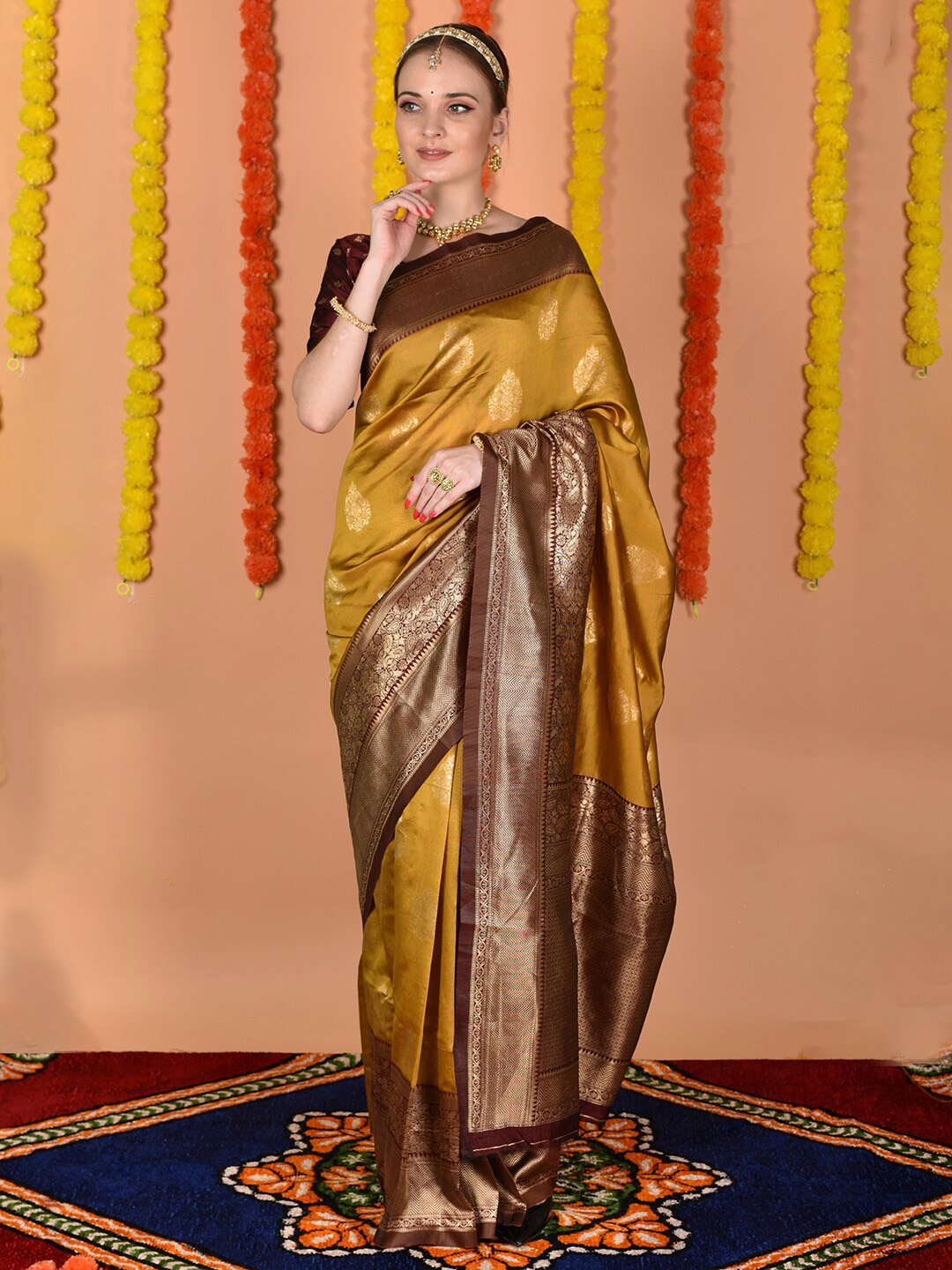 

Anouk Yellow & Brown Ethnic Motifs Woven Design Zari Saree