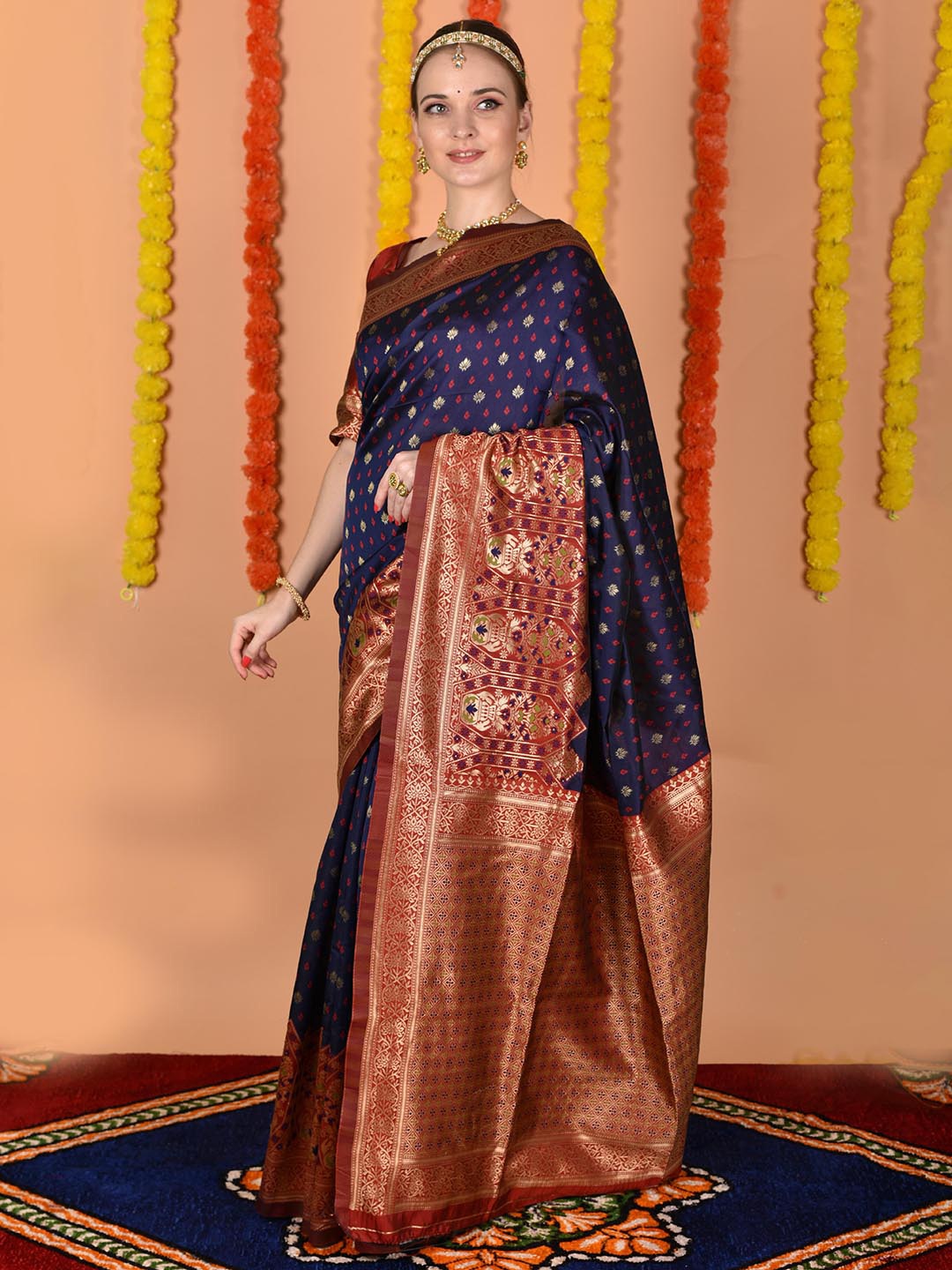 

Anouk Blue & Gold-Toned Ethnic Motifs Woven Design Zari Saree