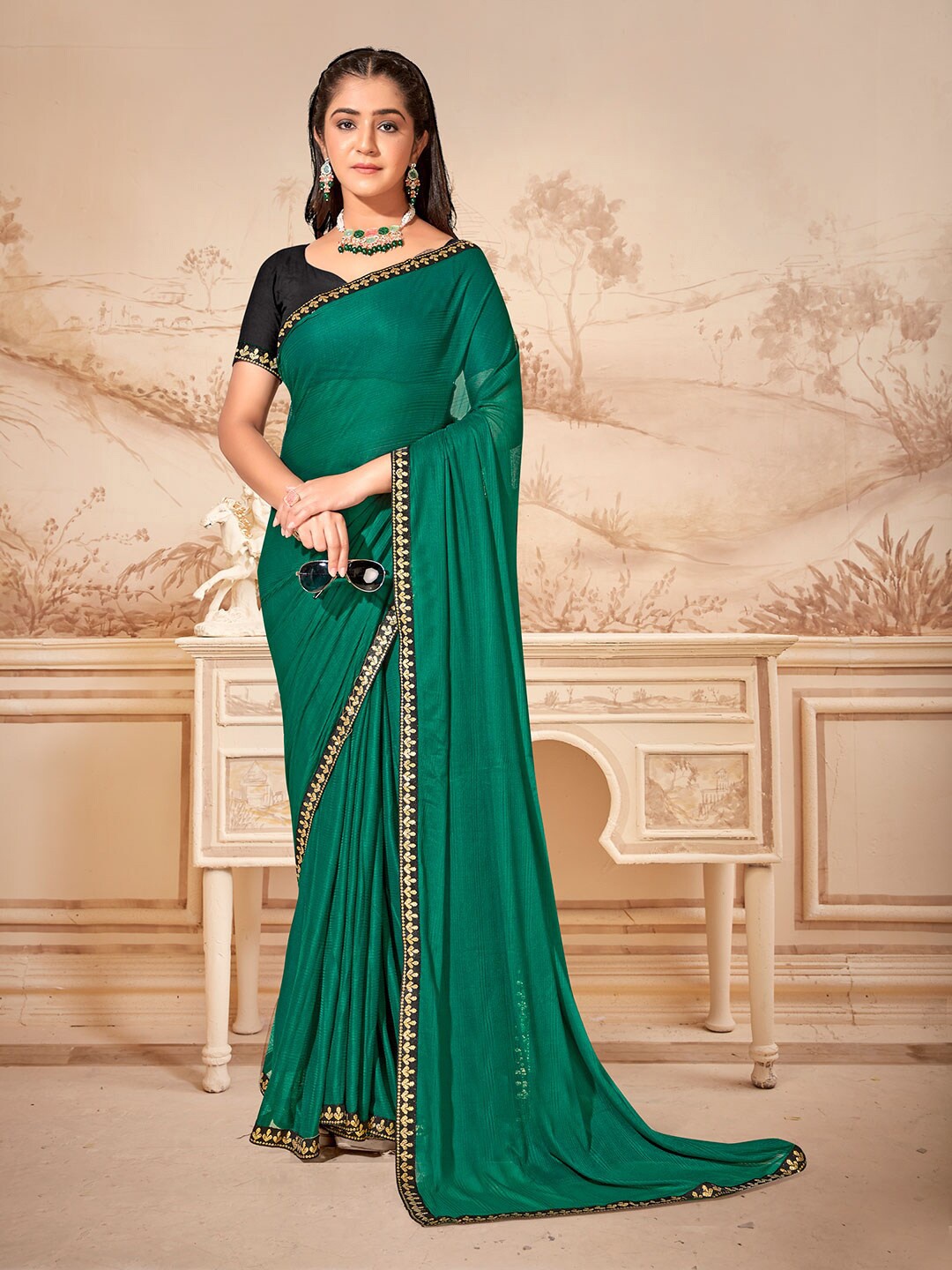 

Anouk Rustic Green & Black Embroidered Pure Chiffon Saree