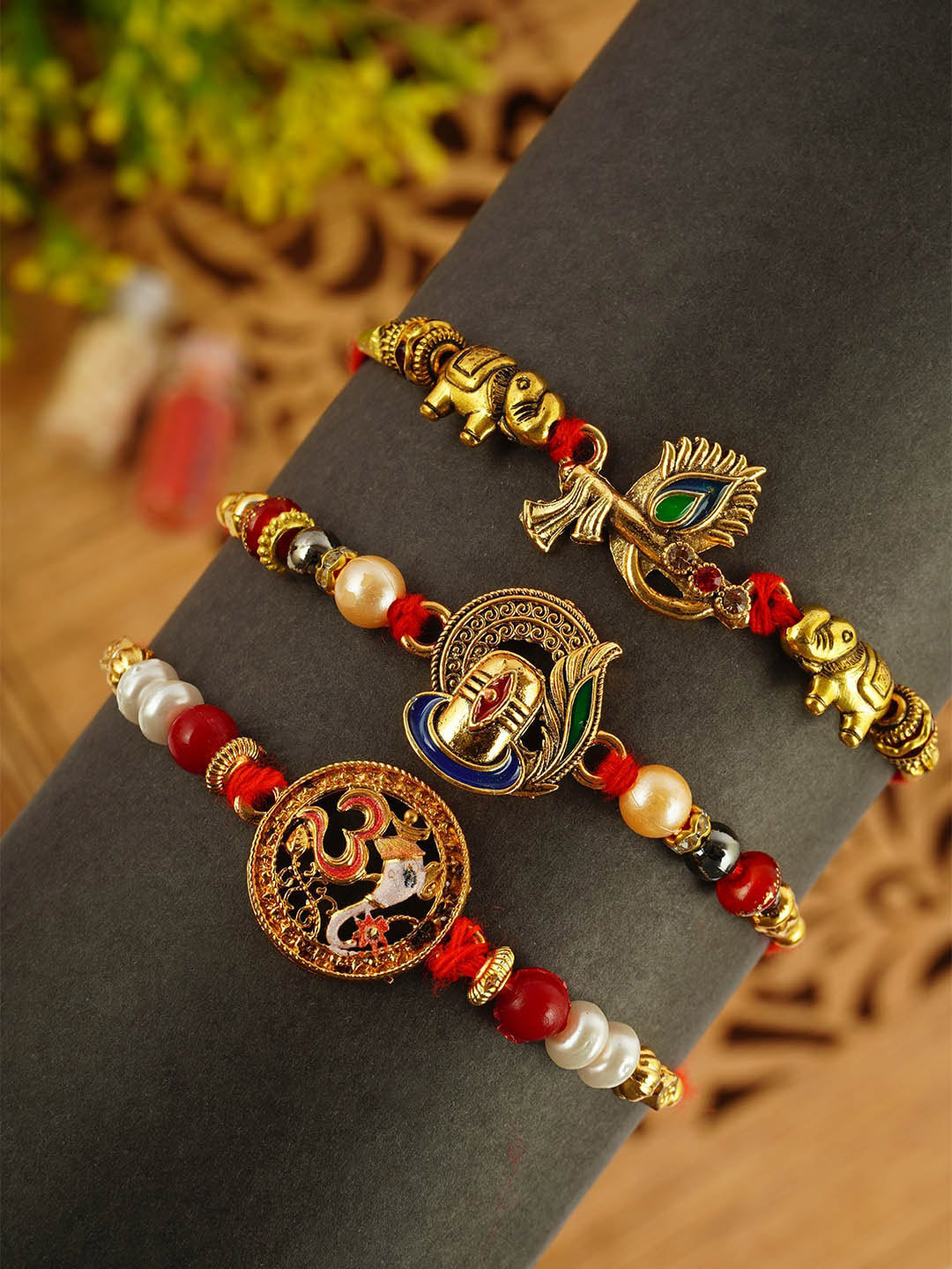 

Urmika Set Of 3 Beaded Thread Rakhis, Gold