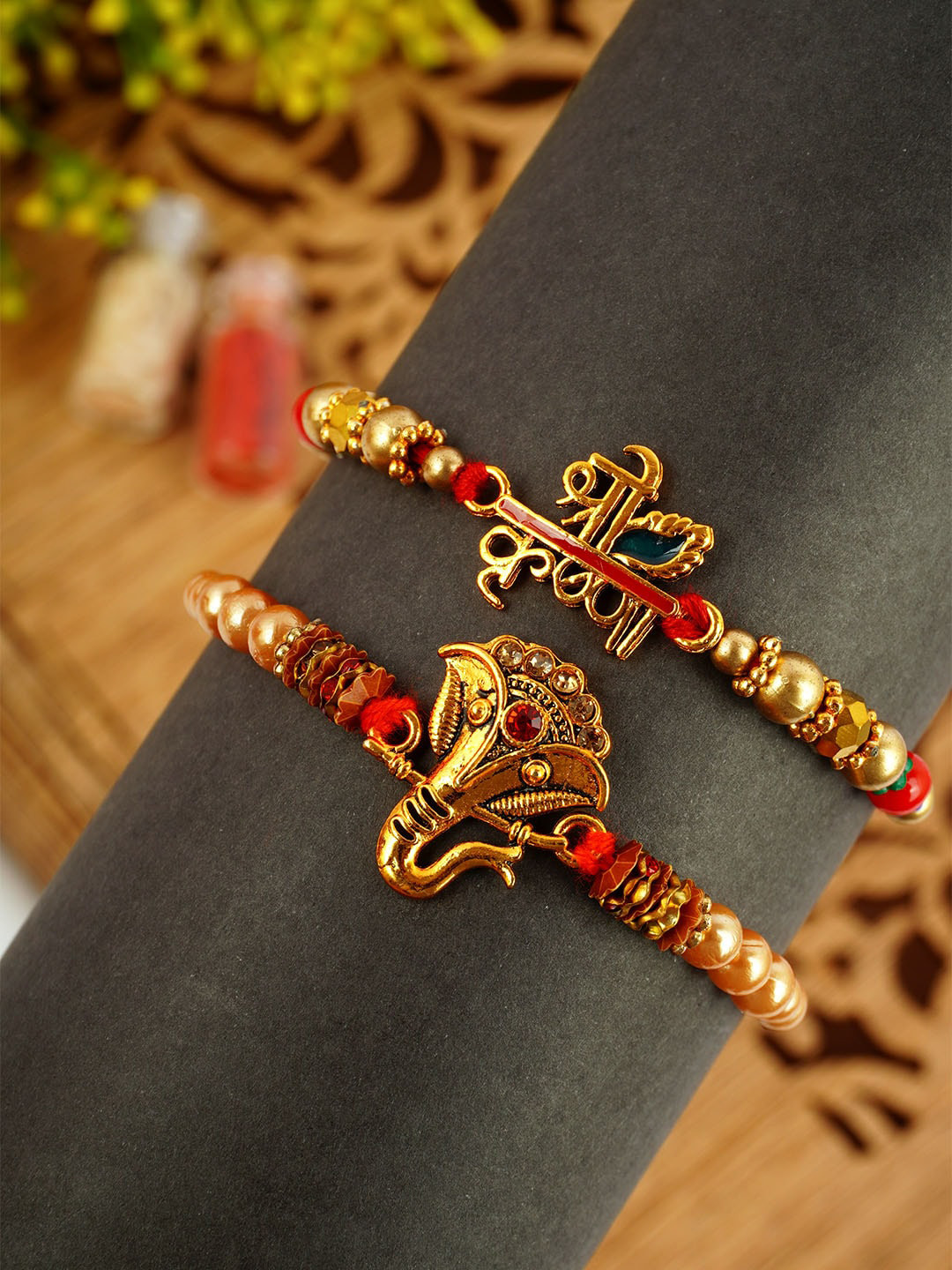 

Urmika Set Of 2 Beaded Thread Rakhis, Gold
