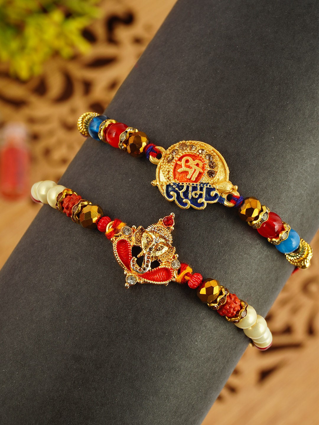 

Urmika Set Of 2 Beaded Thread Rakhis, Red