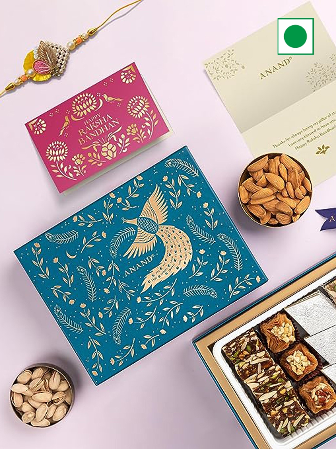 

ANAND Assorted Sweets With Rakhi & Card 385gms, Yellow