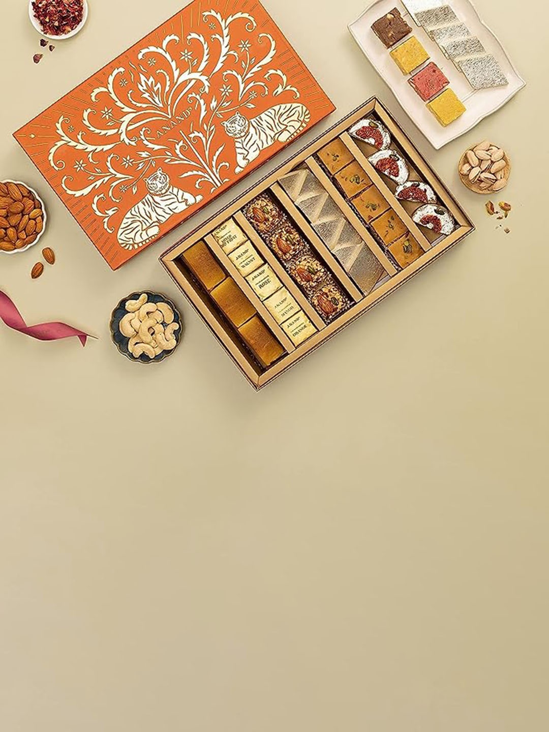 

ANAND Charm Rakhi With Greeting & Assorted Gift Set, Gold