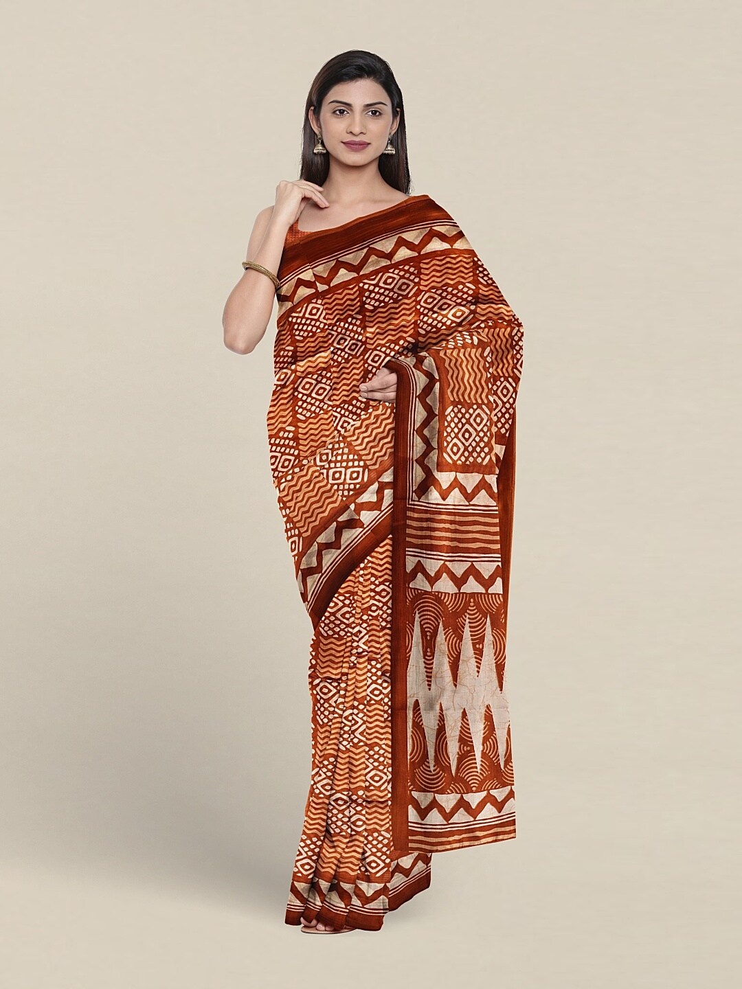 

Pothys Geometric Printed Saree, Rust