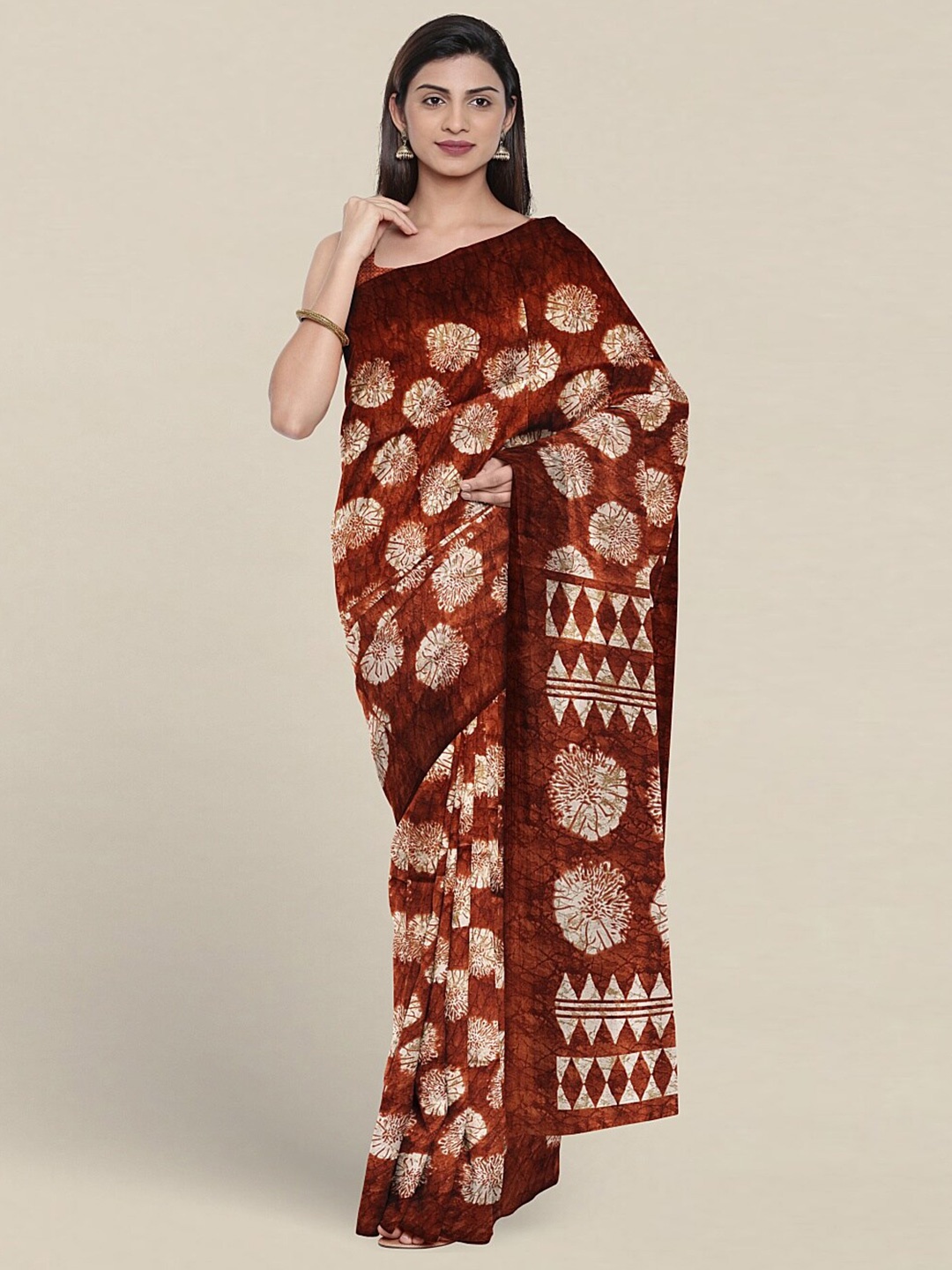 

Pothys Abstract printed Saree, Rust