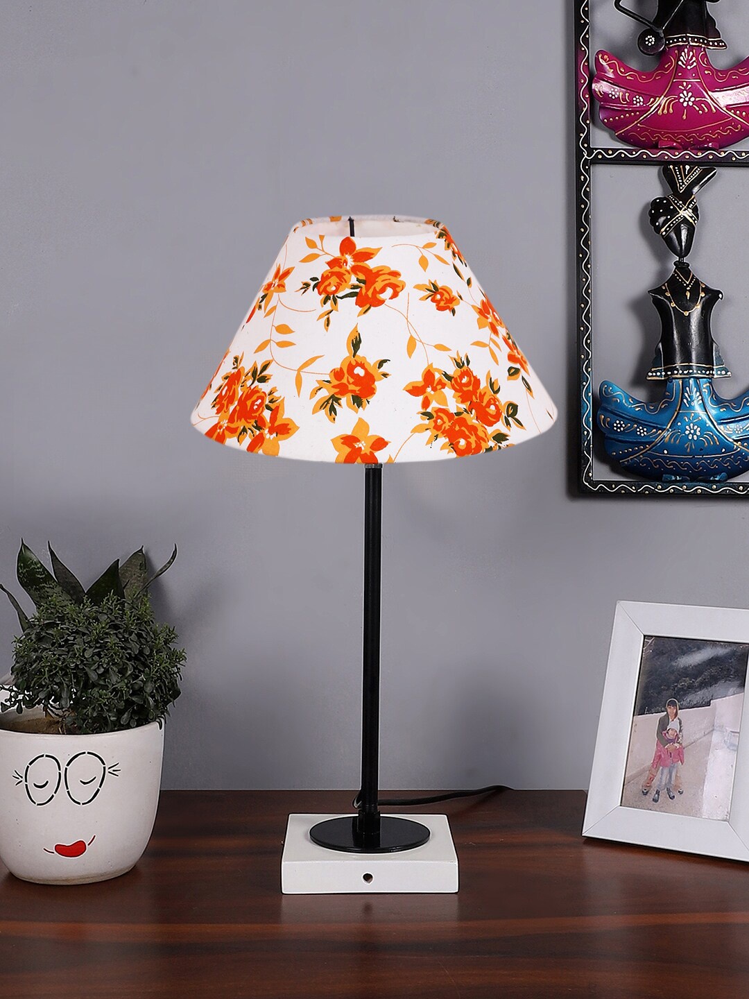 

Devansh White & Orange Floral Printed Wood Table Lamp