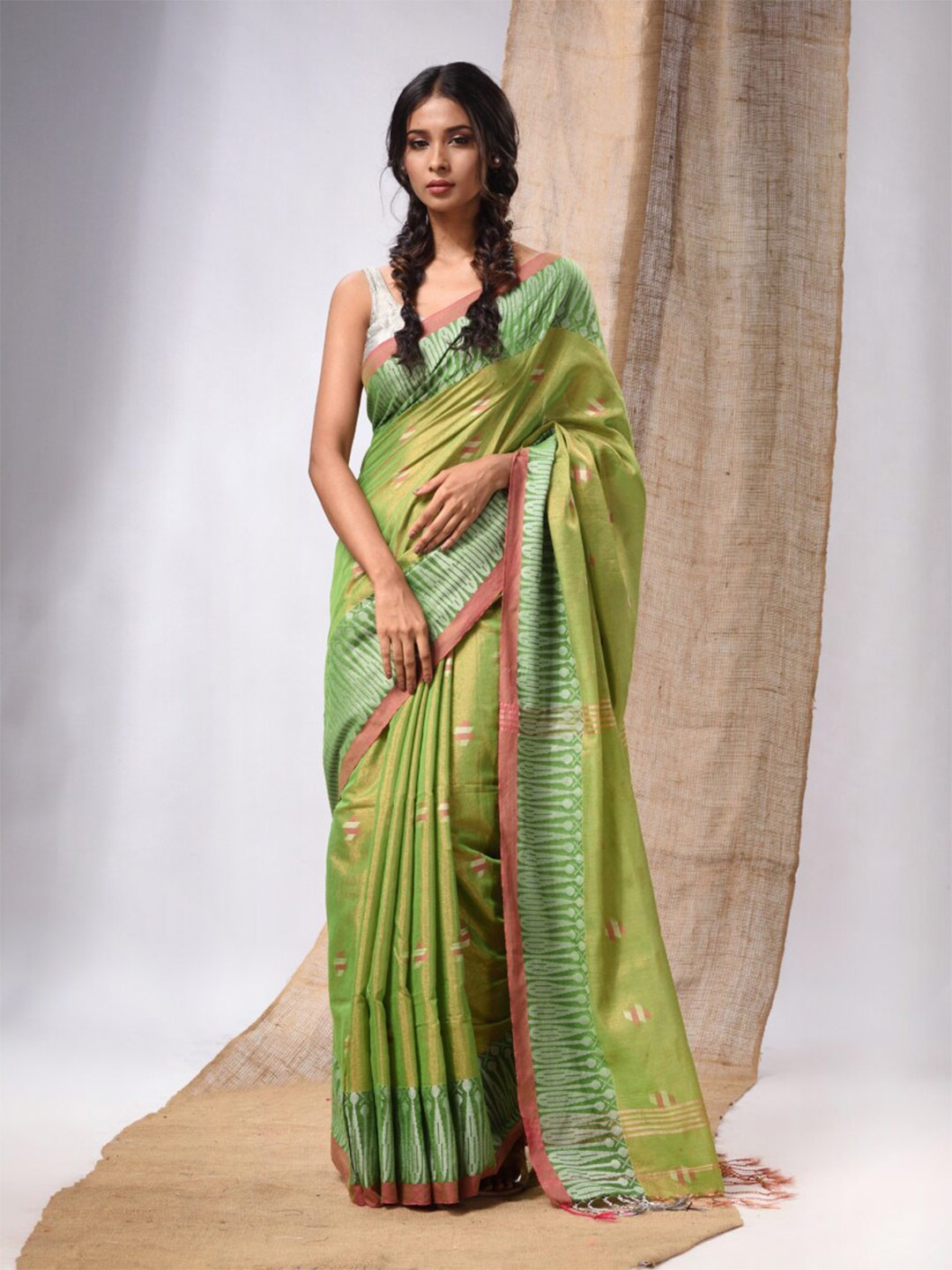 

Charukriti Ethnic Motifs Woven Design Zari Tissue Saree, Green