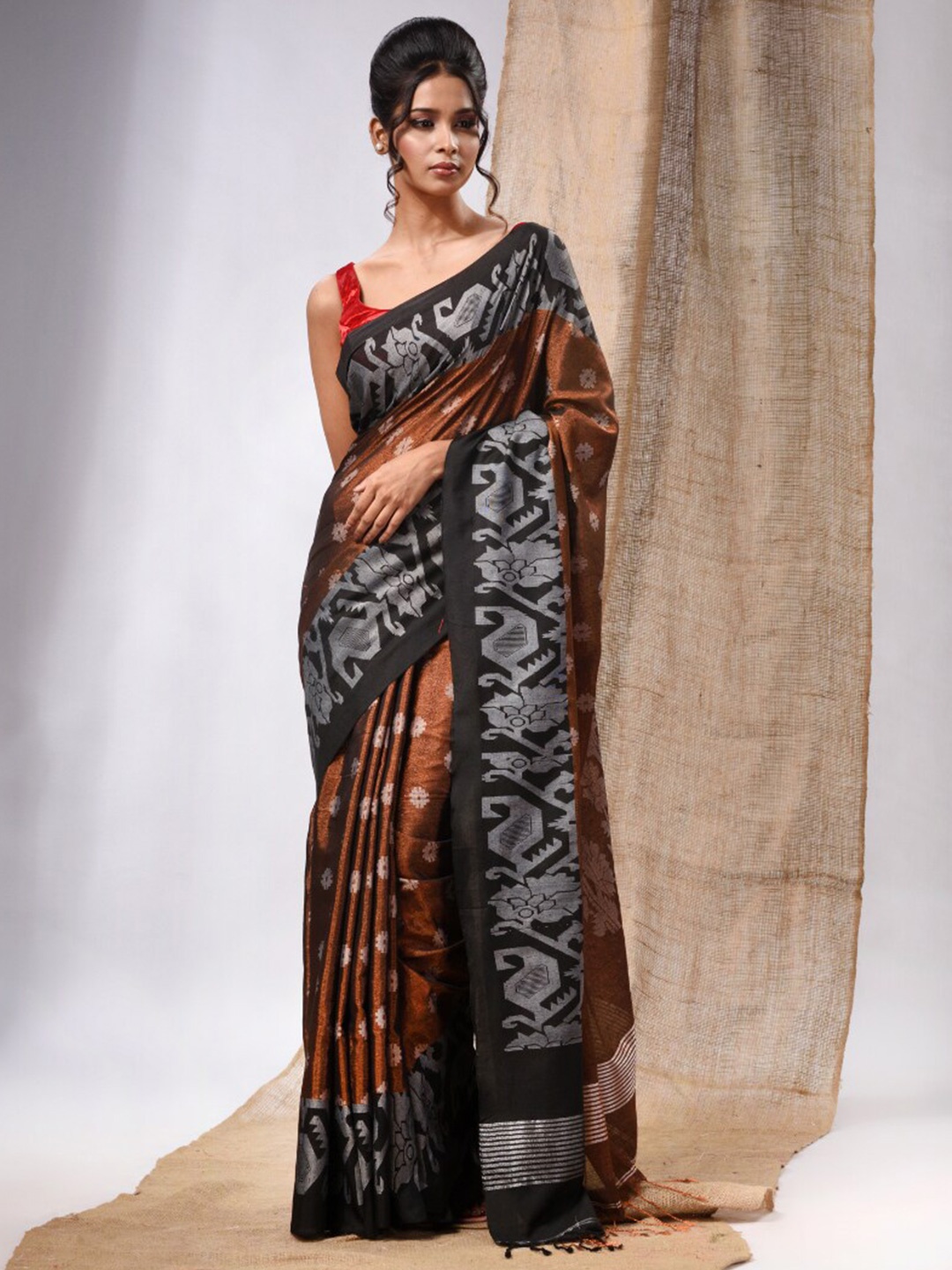 

Charukriti Woven Design Tissue Saree, Copper