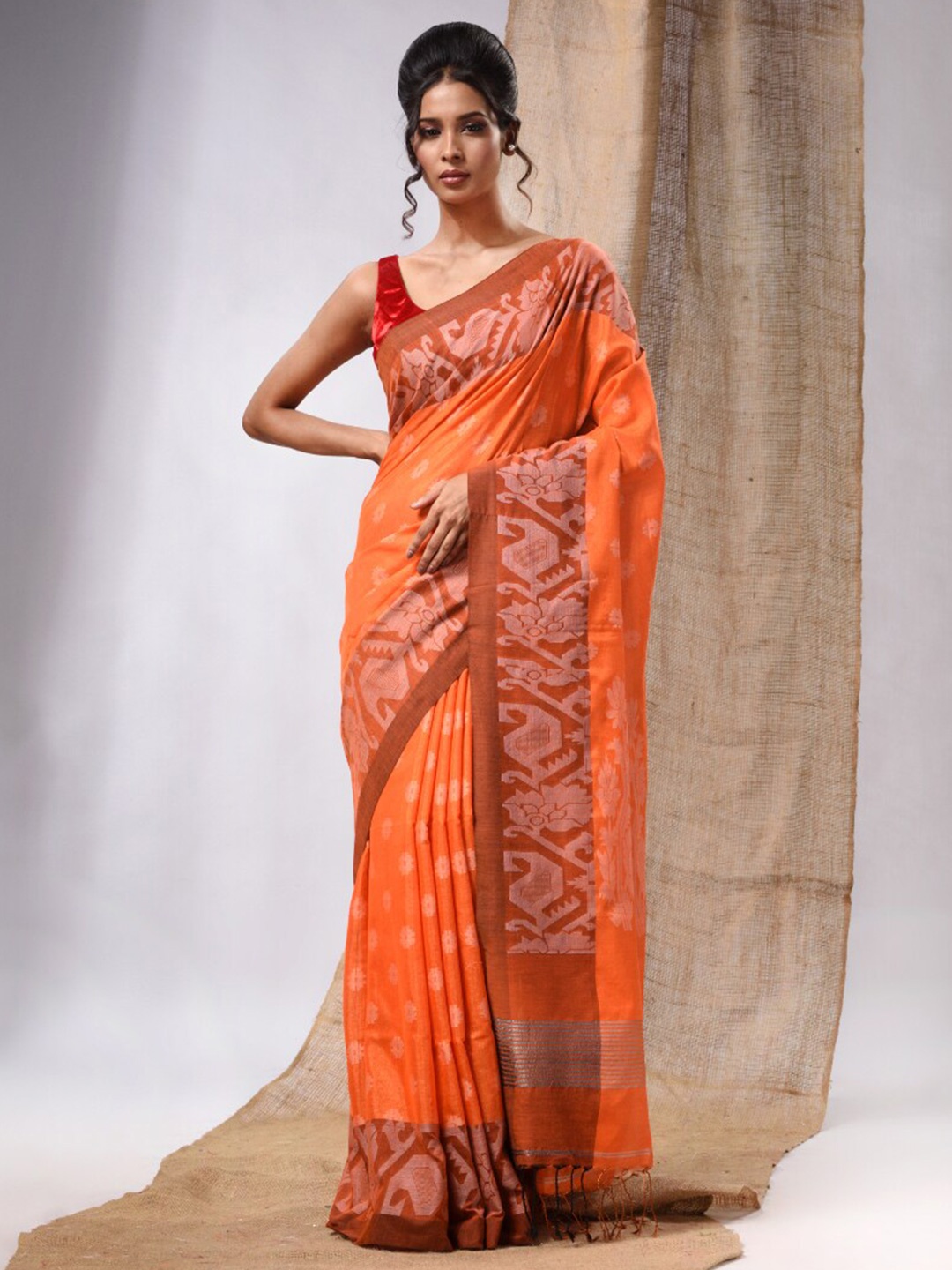 

Charukriti Woven Design Tissue Saree, Orange
