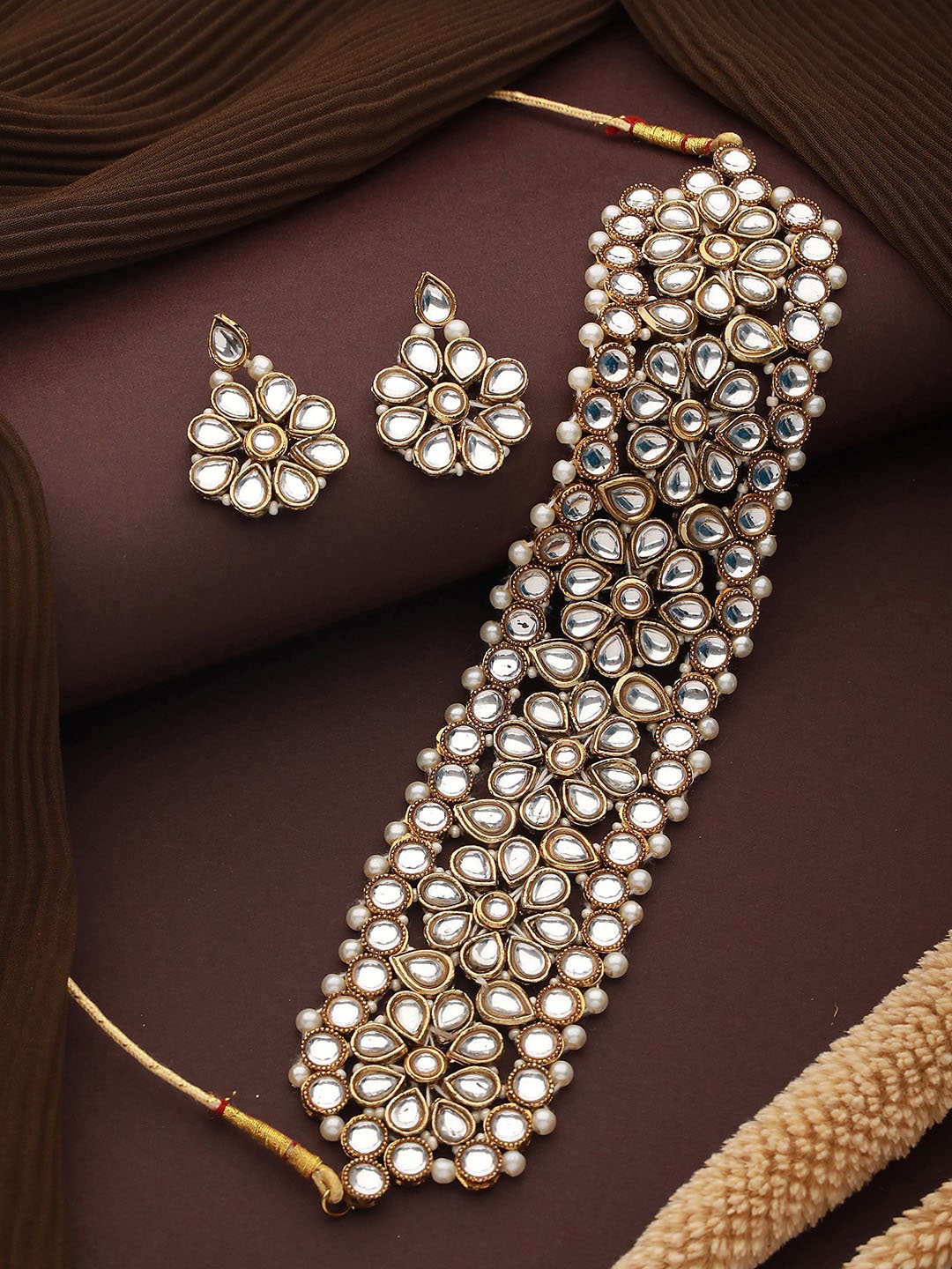 

Jazz and Sizzle Gold-Plated Kundan-Studded Jewellery Set
