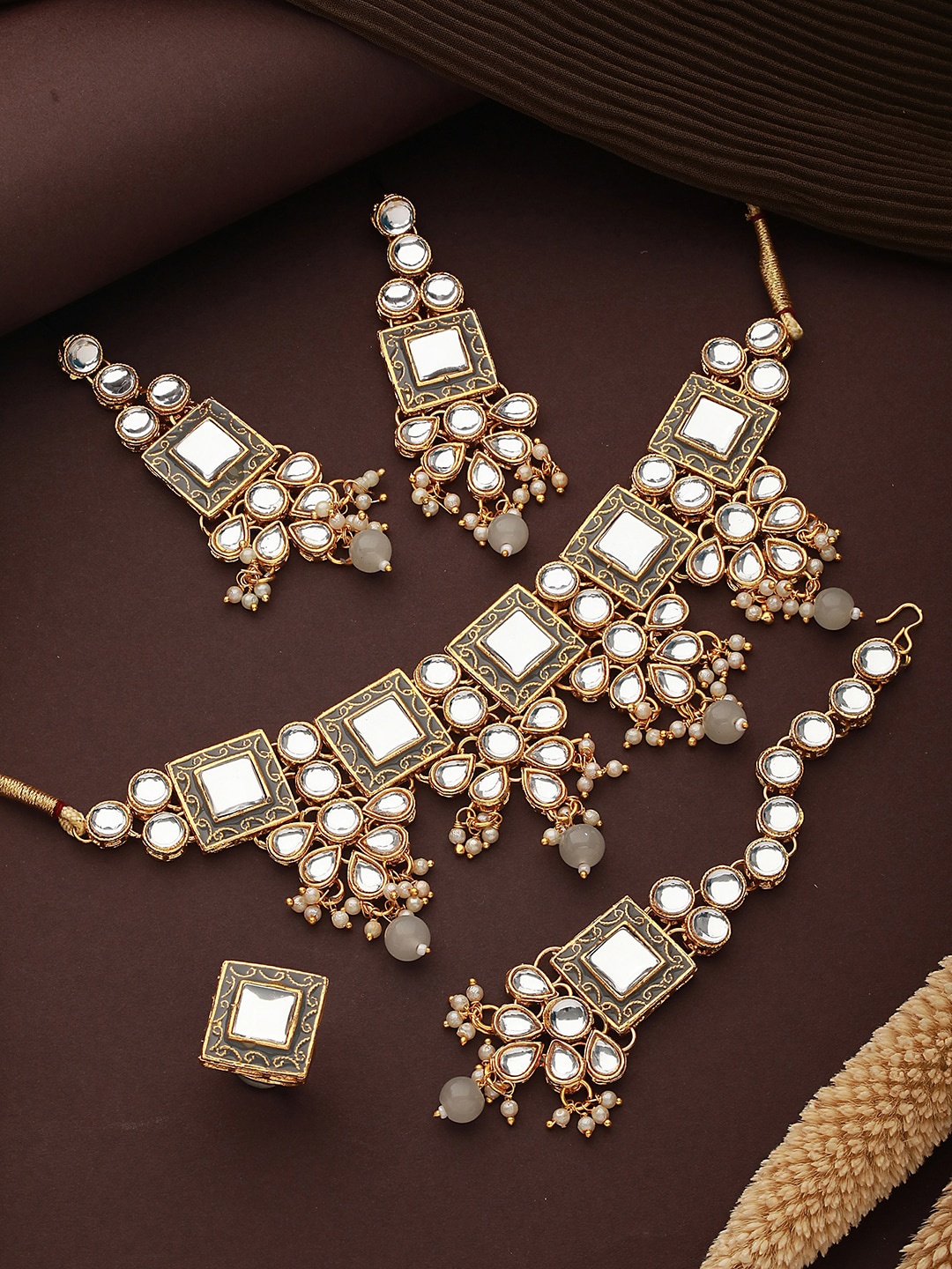 

Jazz and Sizzle Gold-Plated Kundan-Studded & Pearl Beaded Jewellery Set