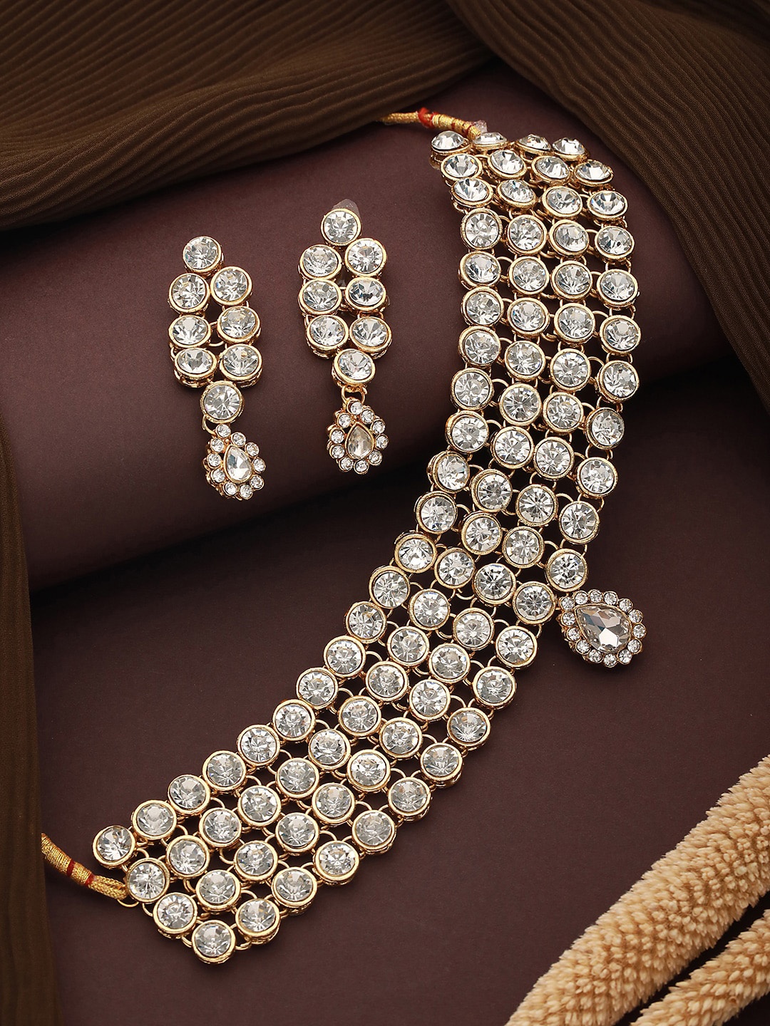 

Jazz and Sizzle Gold-Plated Stone Studded Jewellery Set