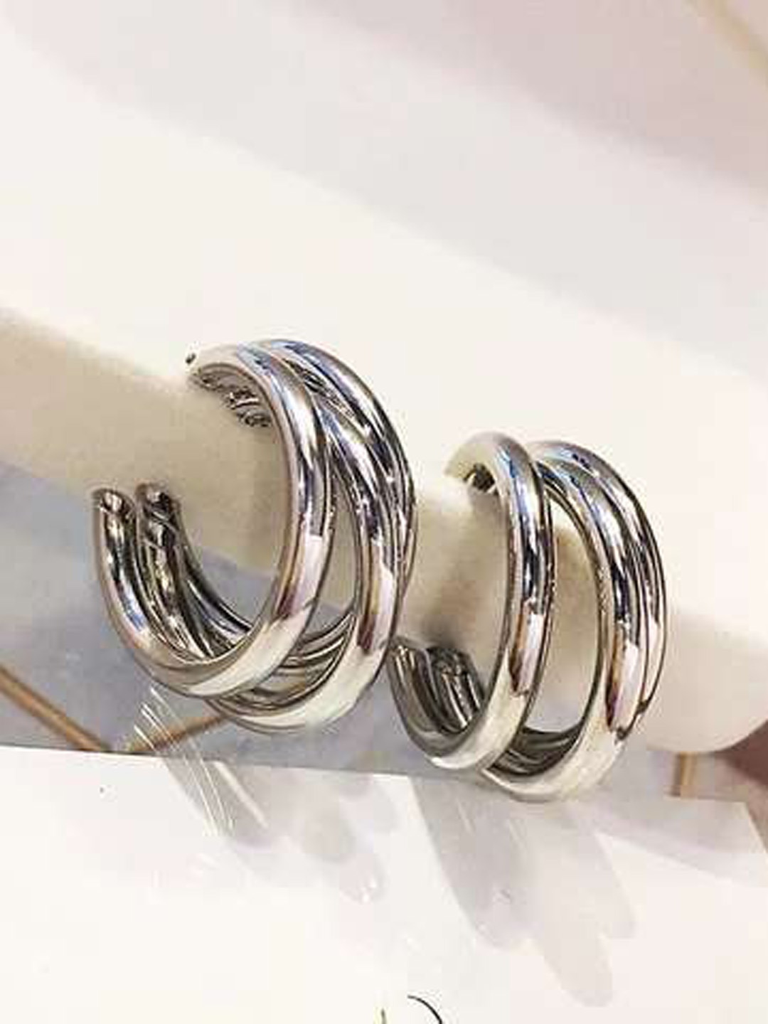 

Krelin Silver-Plated Half Hoop Earrings