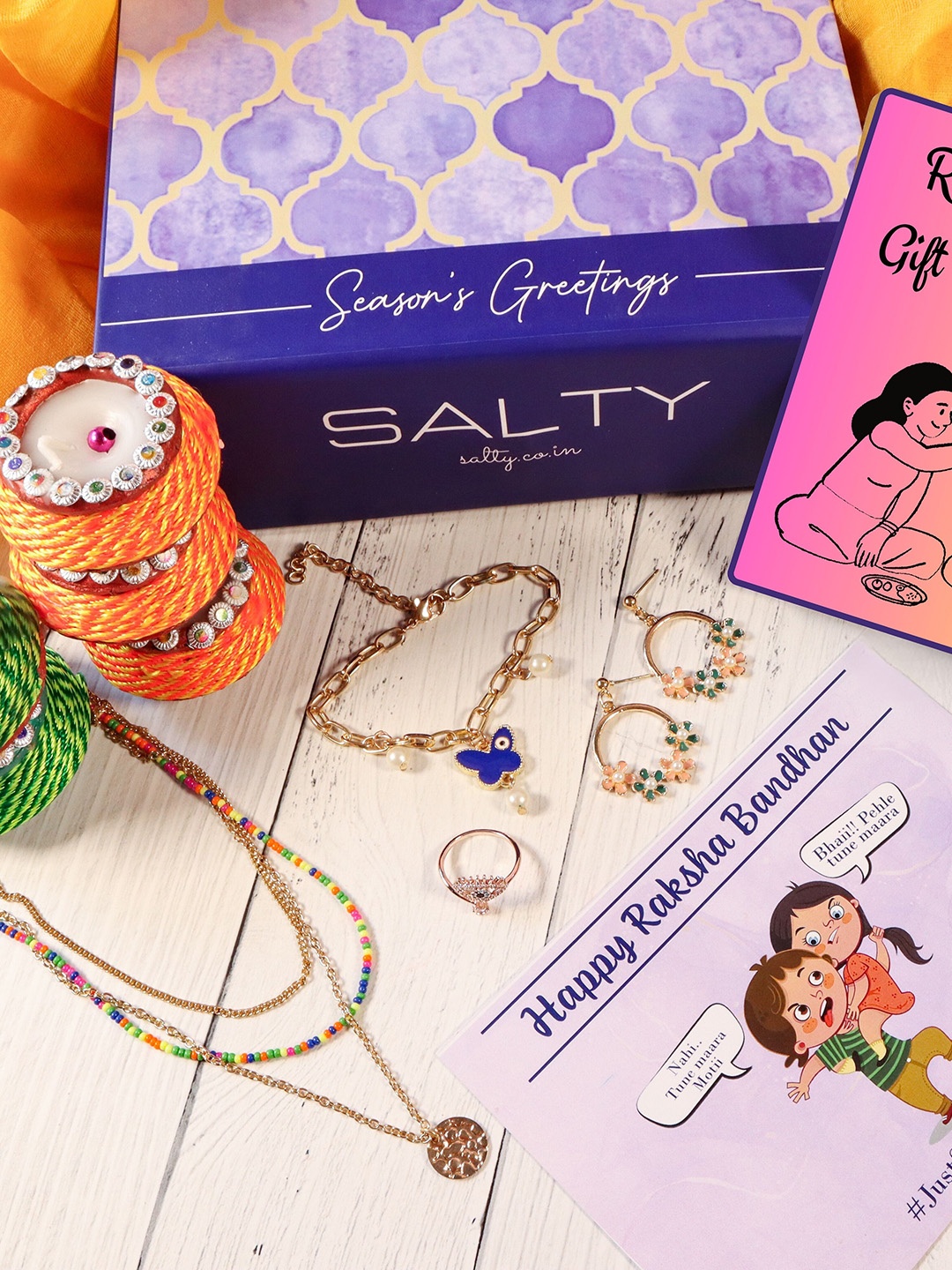 

SALTY Butterfly Painted Evil Eye Charm Rakhi With Necklace Earrings & Ring, Gold