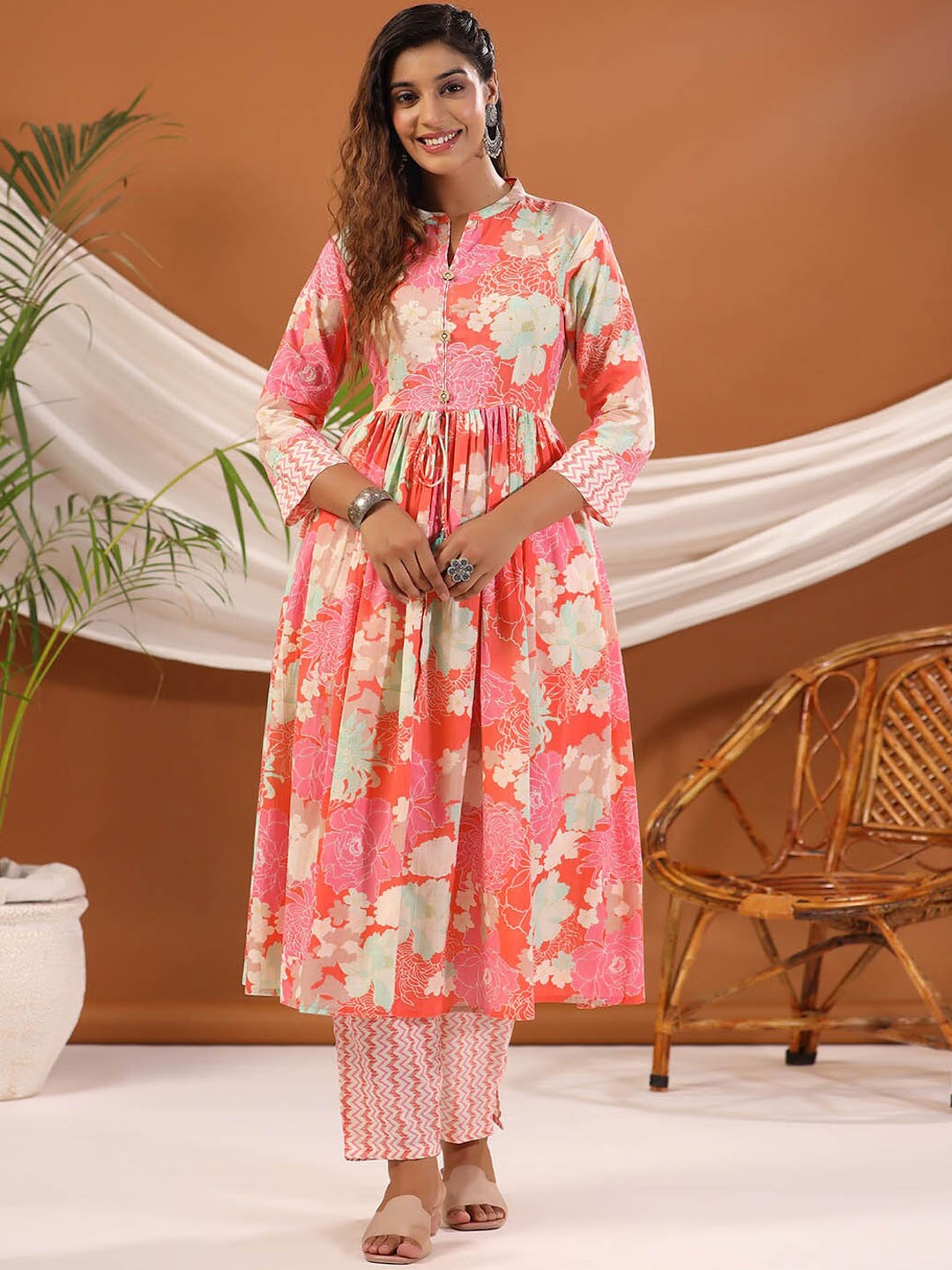 

Meena Bazaar Mandarin Collar Floral Printed Regular Kurta with Trousers, Peach