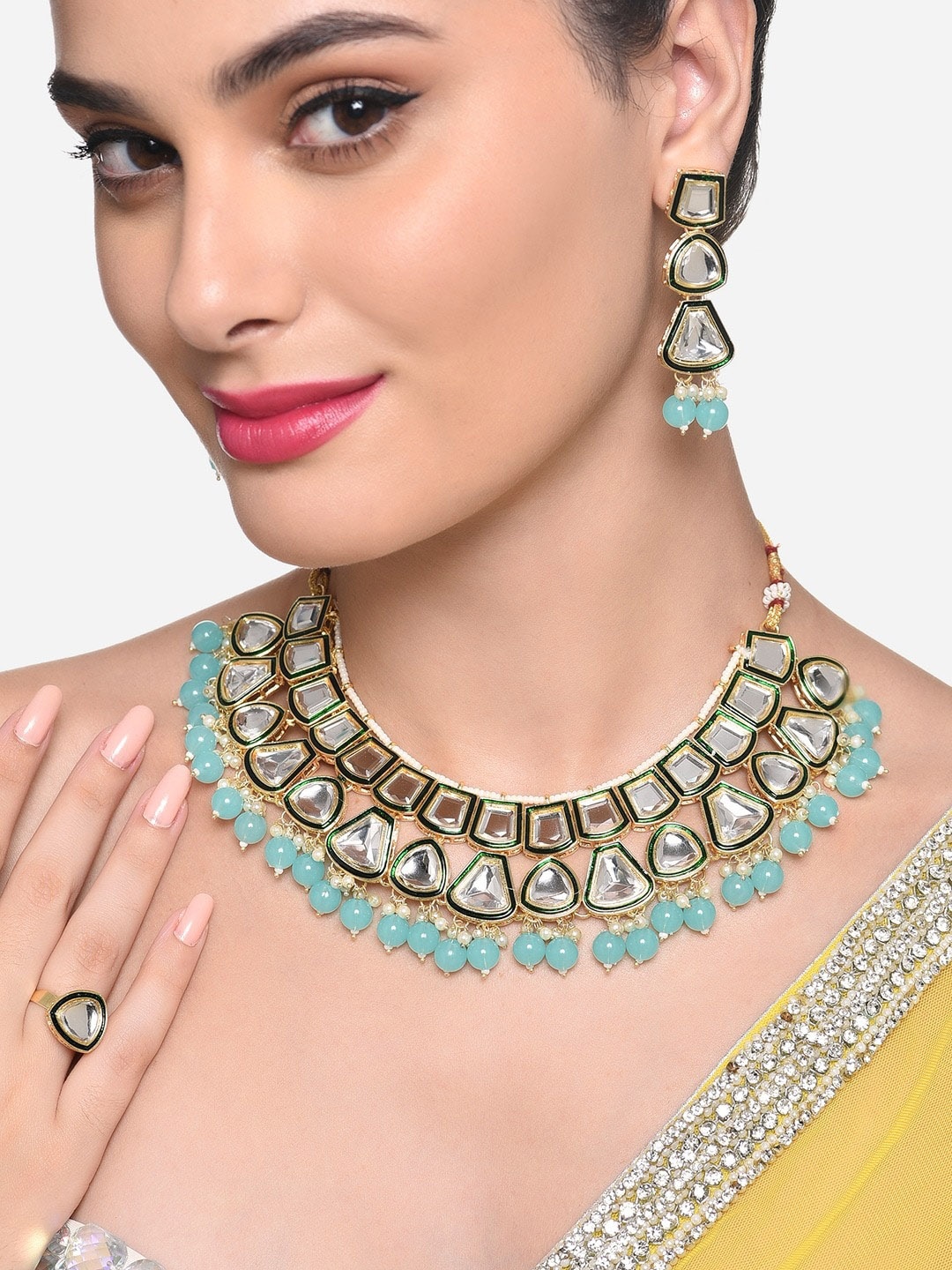 

Zaveri Pearls Gold Plated Kundan Studded & Pearl Beaded Jewellery Set
