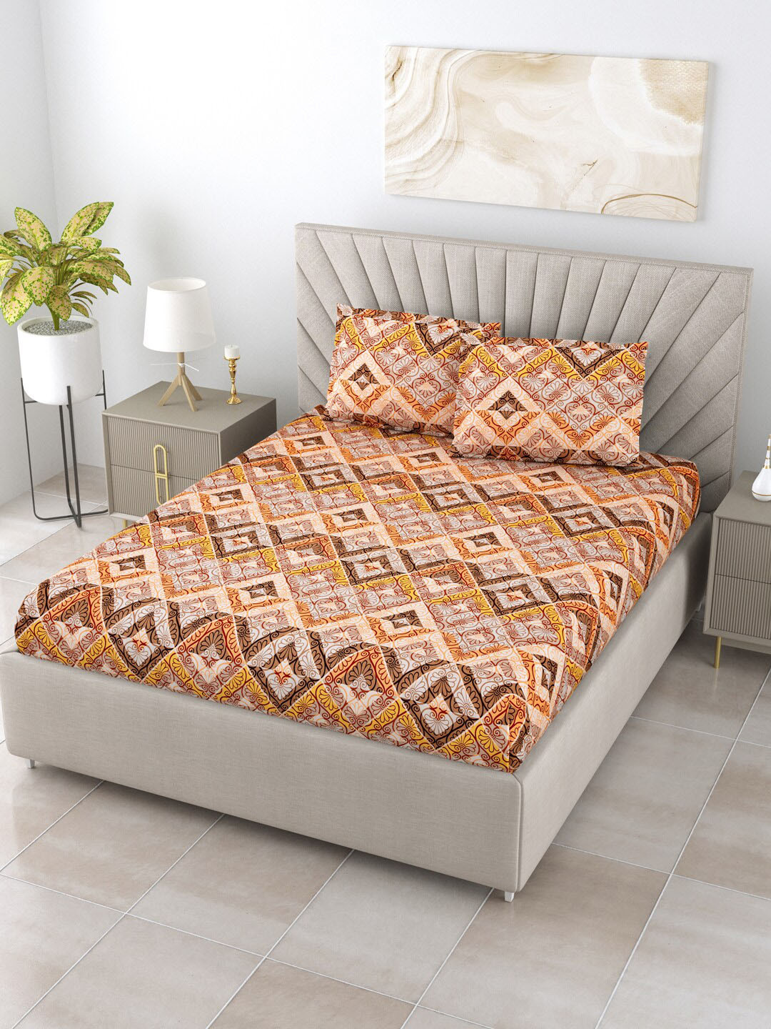 

BOMBAY DYEING Epigram Brown & Yellow Floral Cotton 120 TC Queen Bedsheet & 2 Pillow Covers