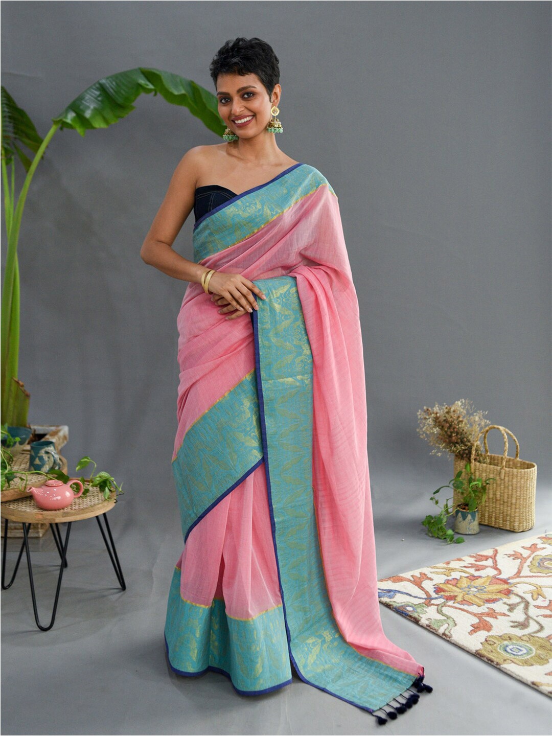 

Suta Pink & Blue Floral Woven Design Zari Pure Cotton Saree