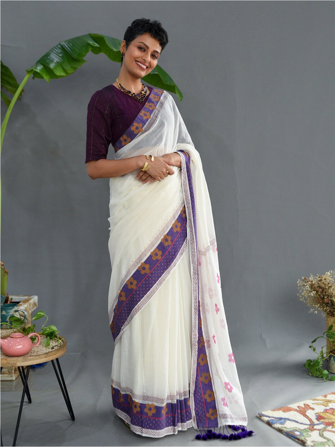 

Suta White & Purple Floral Printed Pure Cotton Saree