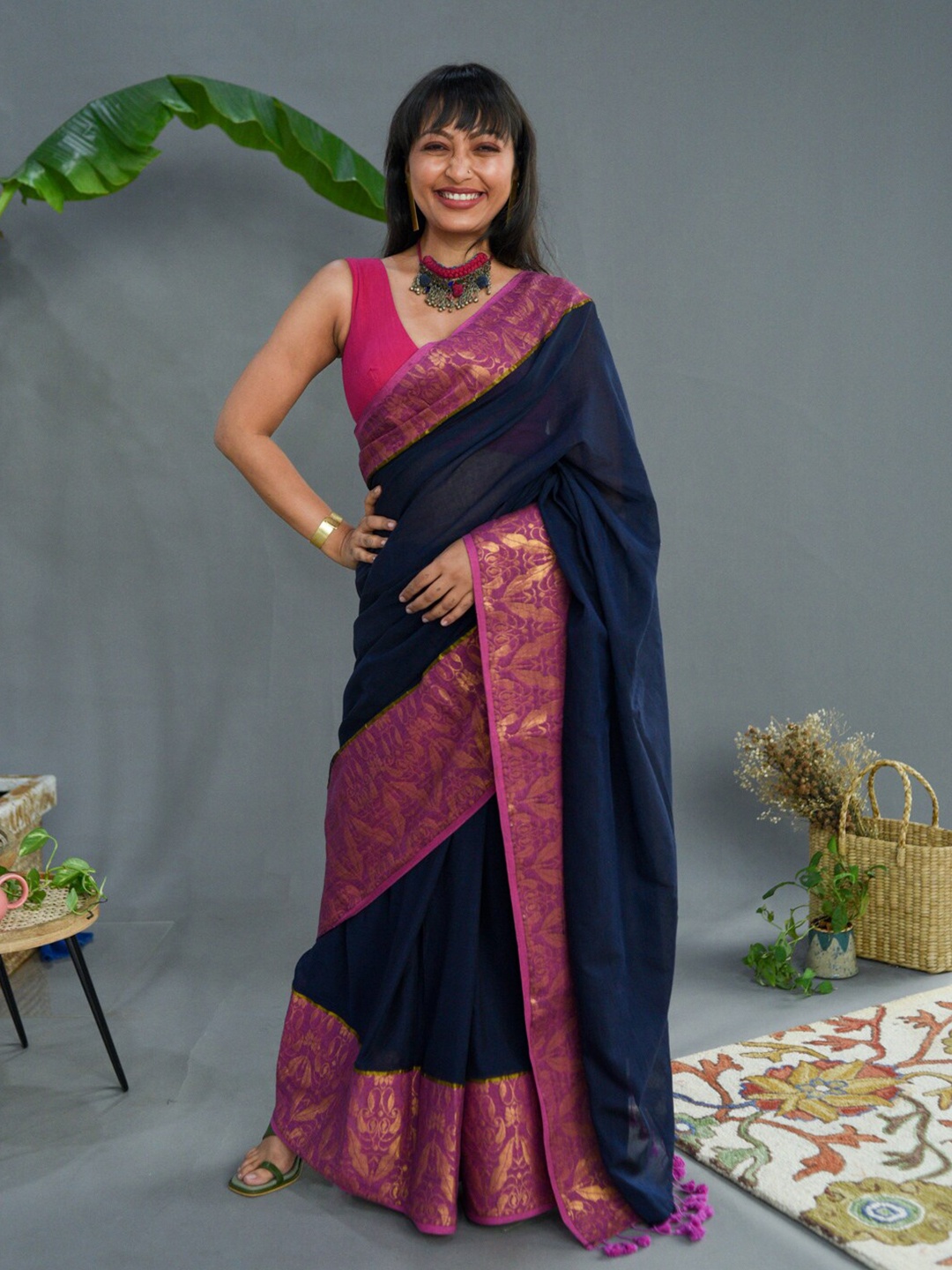 

Suta Navy Blue & Pink Floral Woven Design Zari Pure Cotton Saree