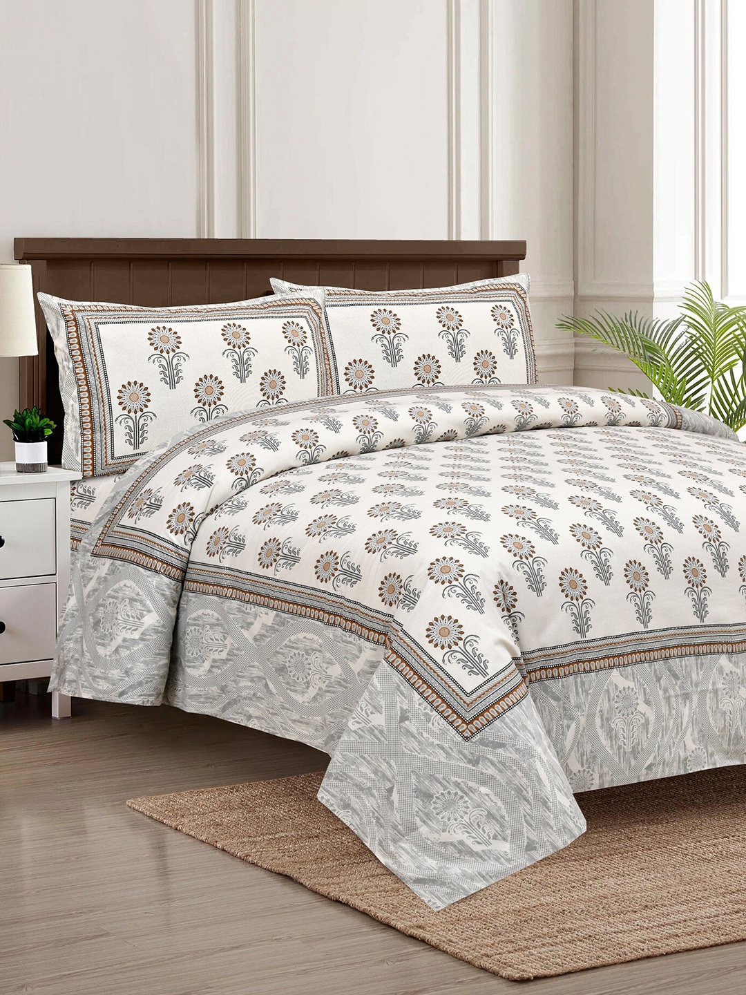 

Stylespace by Isha Jaipuri White Printed Cotton 250 TC King Bedsheet with 2 Pillow Covers