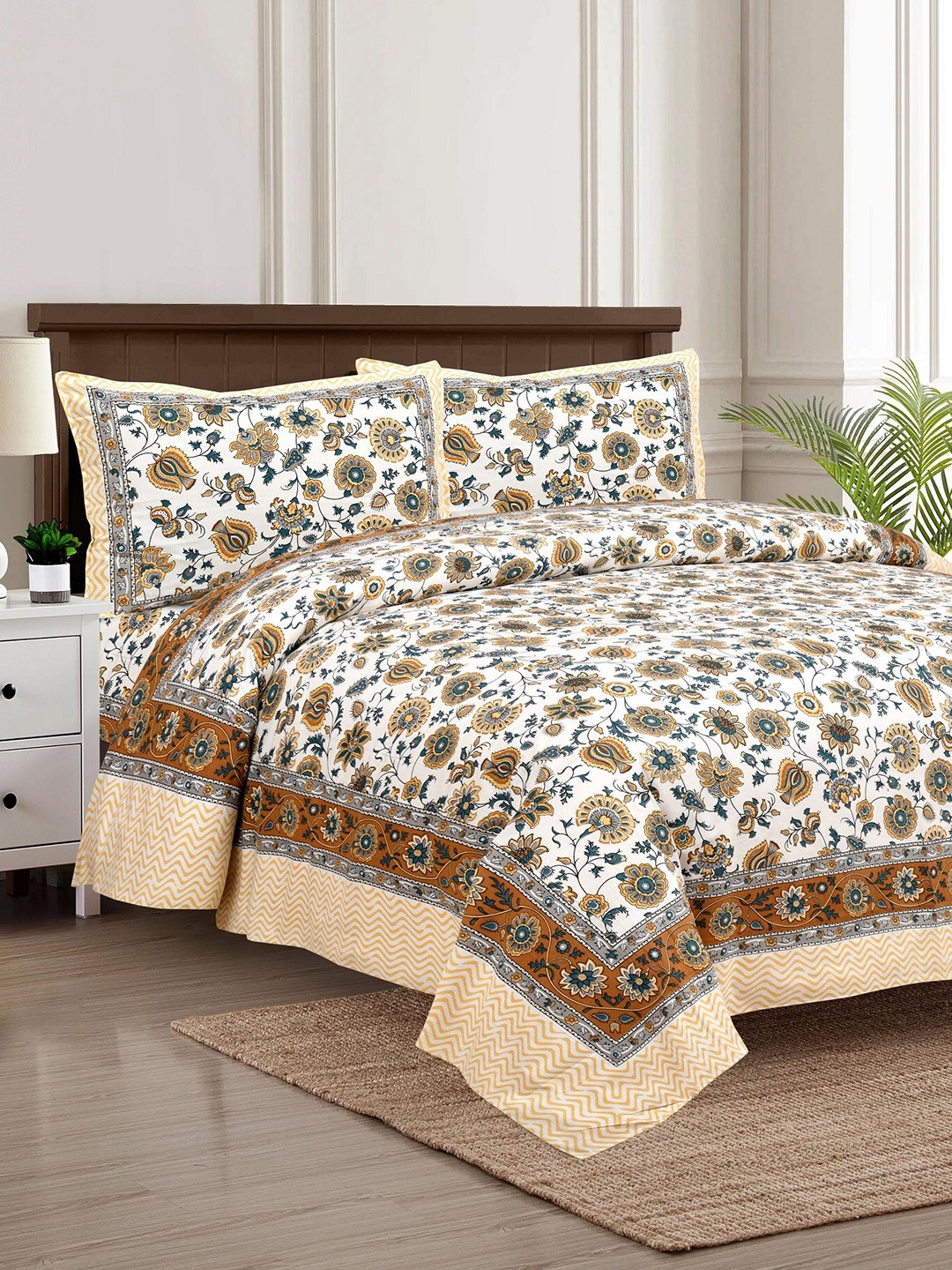 

Stylespace by Isha Jaipuri White Printed Cotton 250 TC King Bedsheet with 2 Pillow Covers