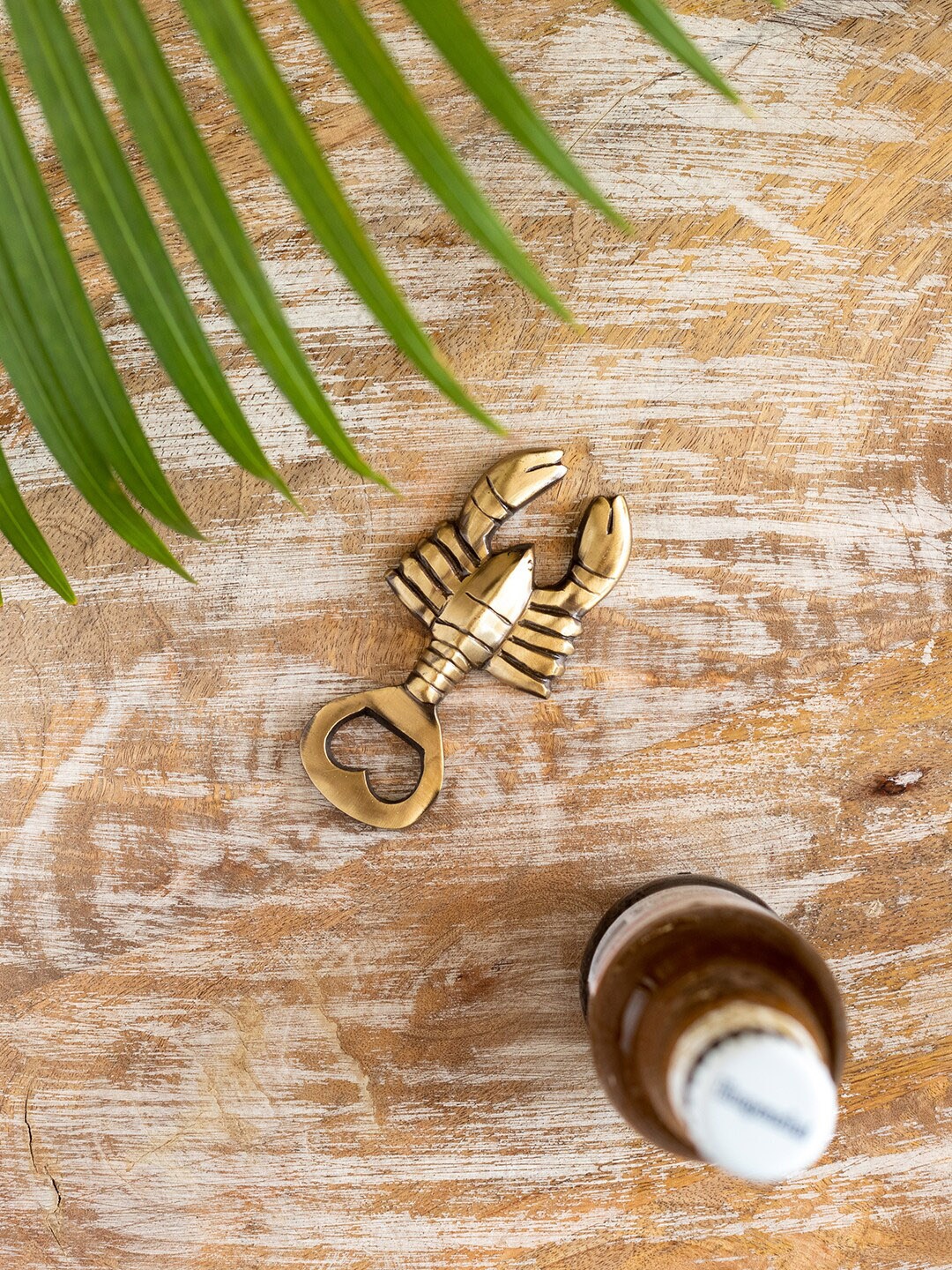

ExclusiveLane Beige Lobster Brass Bottle Opener