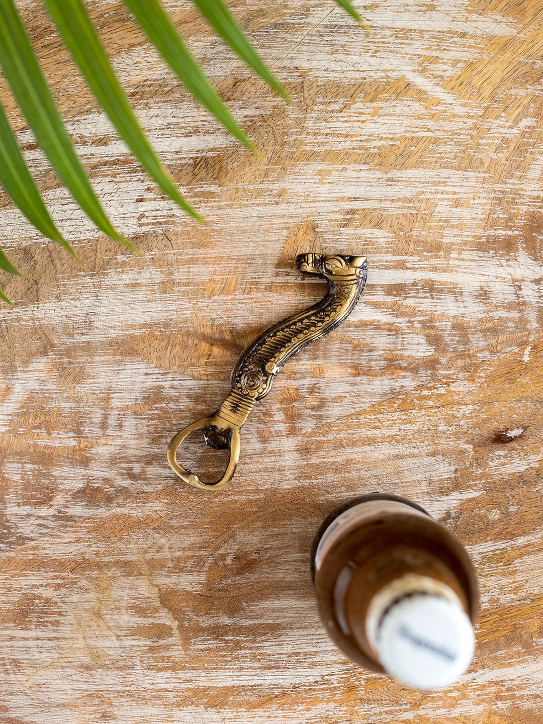 

ExclusiveLane Beige Seahorse Brass Bottle Opener