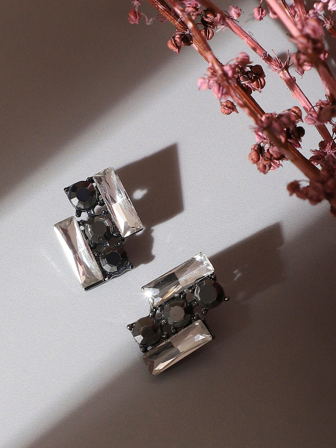 

SOHI Silver-Plated Contemporary Stud Earrings