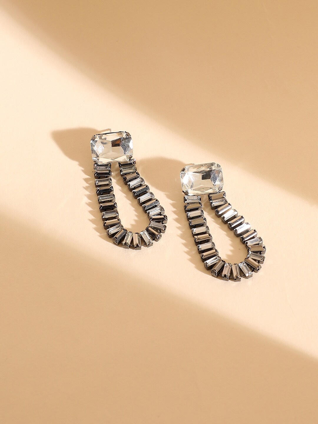 

SOHI Silver-Plated Contemporary Drop Earrings