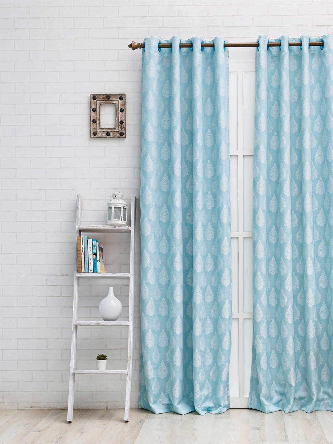 

Ariana Turquoise Blue & White Ethnic Motifs Black Out Long Door Curtain