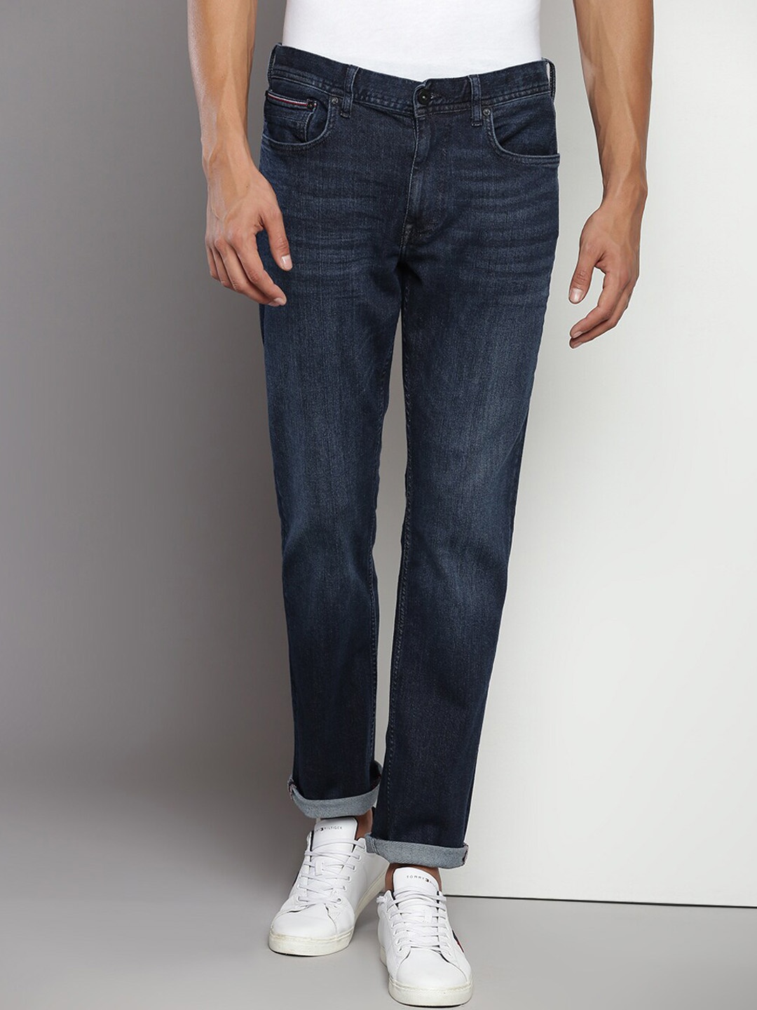 

Tommy Hilfiger Men Mid-Rise Light Fade Clean Look Stretchable Jeans, Blue