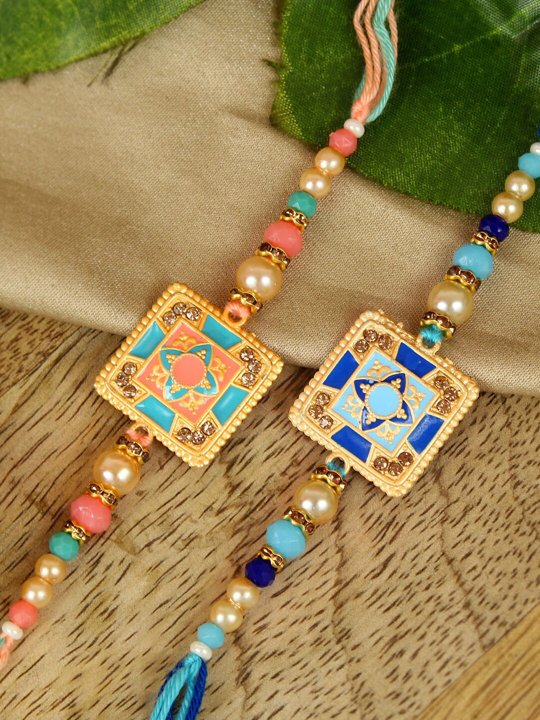

TIED RIBBONS Set Of 2 Square Shaped Charm Rakhi, Blue