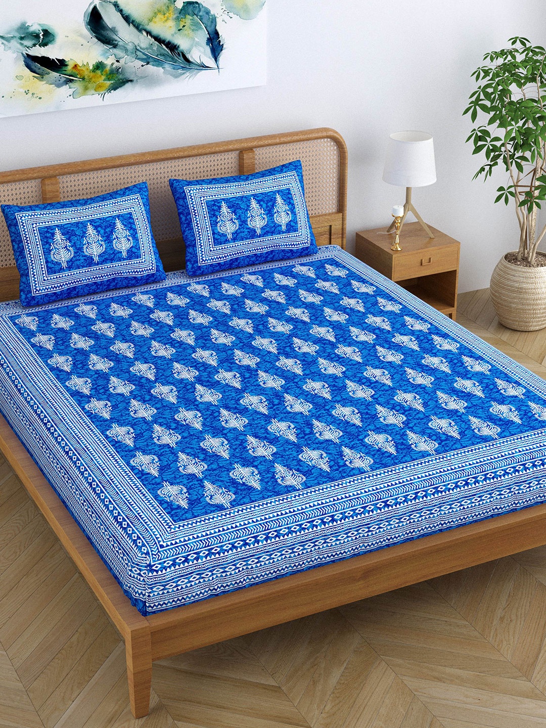 

SheetKart Jaipuri Blue & White Printed Cotton 144 TC Queen Bedsheet with 2 Pillow Covers