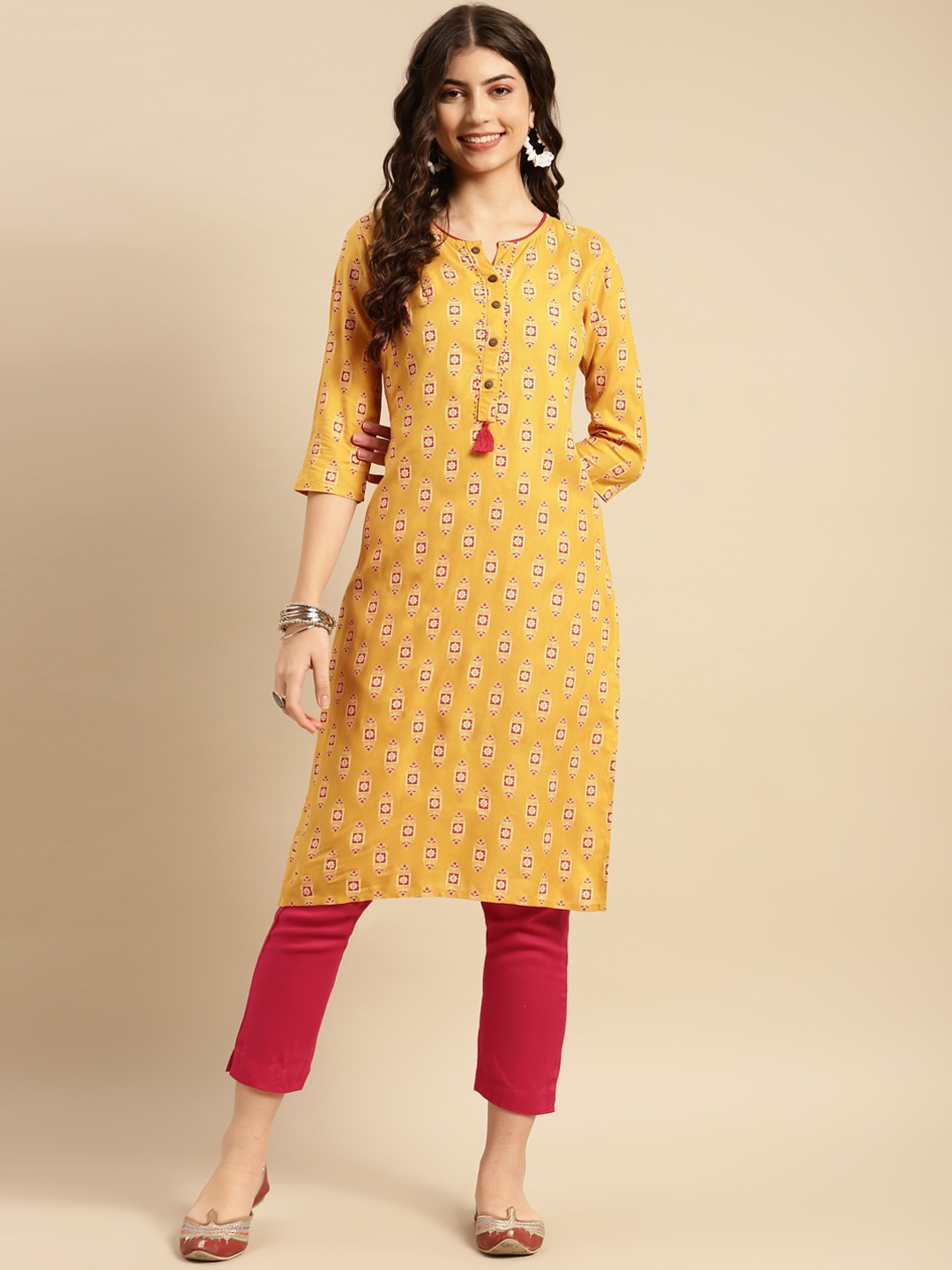 

Rangita Ethnic Motifs Printed Beads and Stones Detail Straight Kurta with Trousers, Mustard