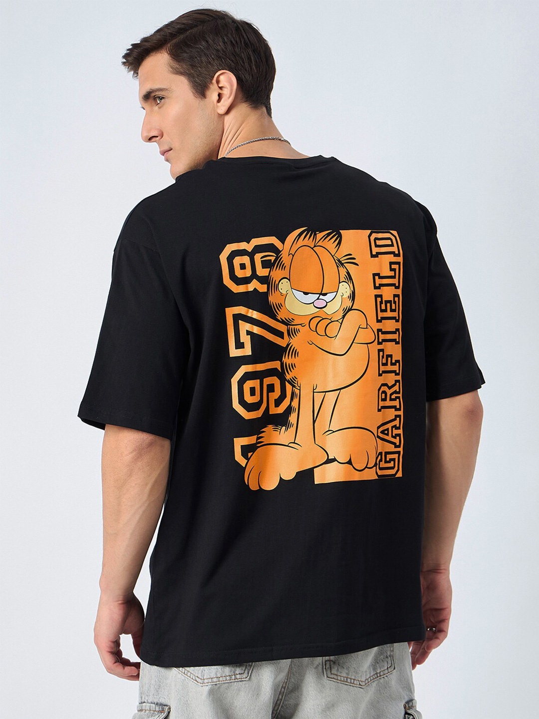 

COLOR CAPITAL Graphic Printed Offical Merchandise Round Neck Pure Cotton Oversized T-Shirt, Black