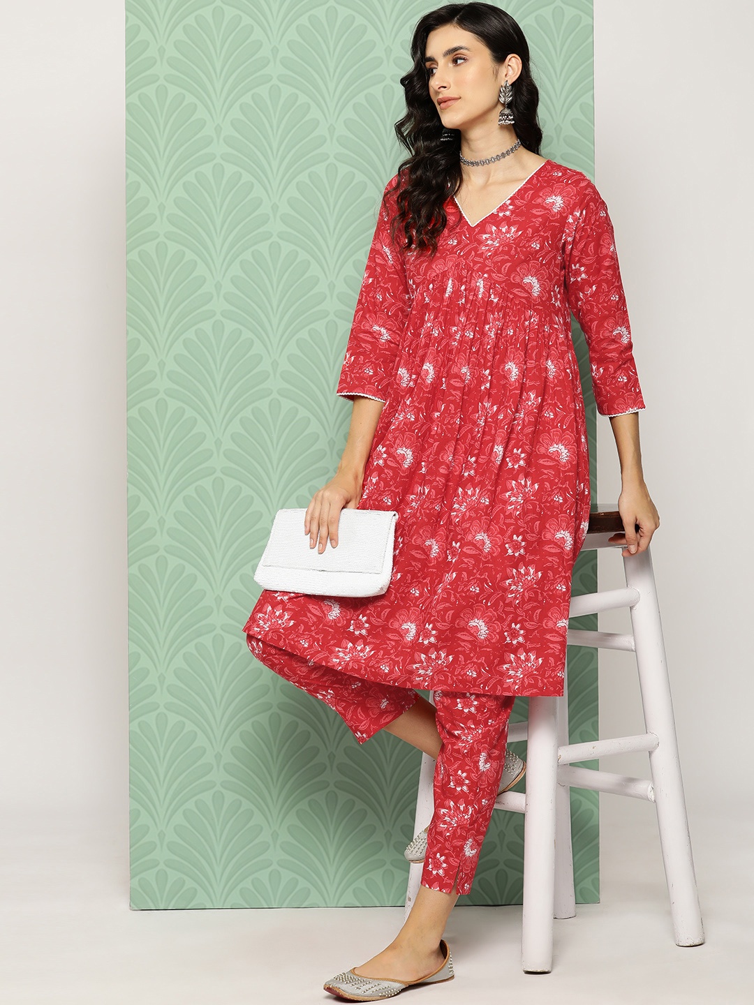 

Janasya Women Floral Printed Regular Pure Cotton Kurta with Trousers, Red